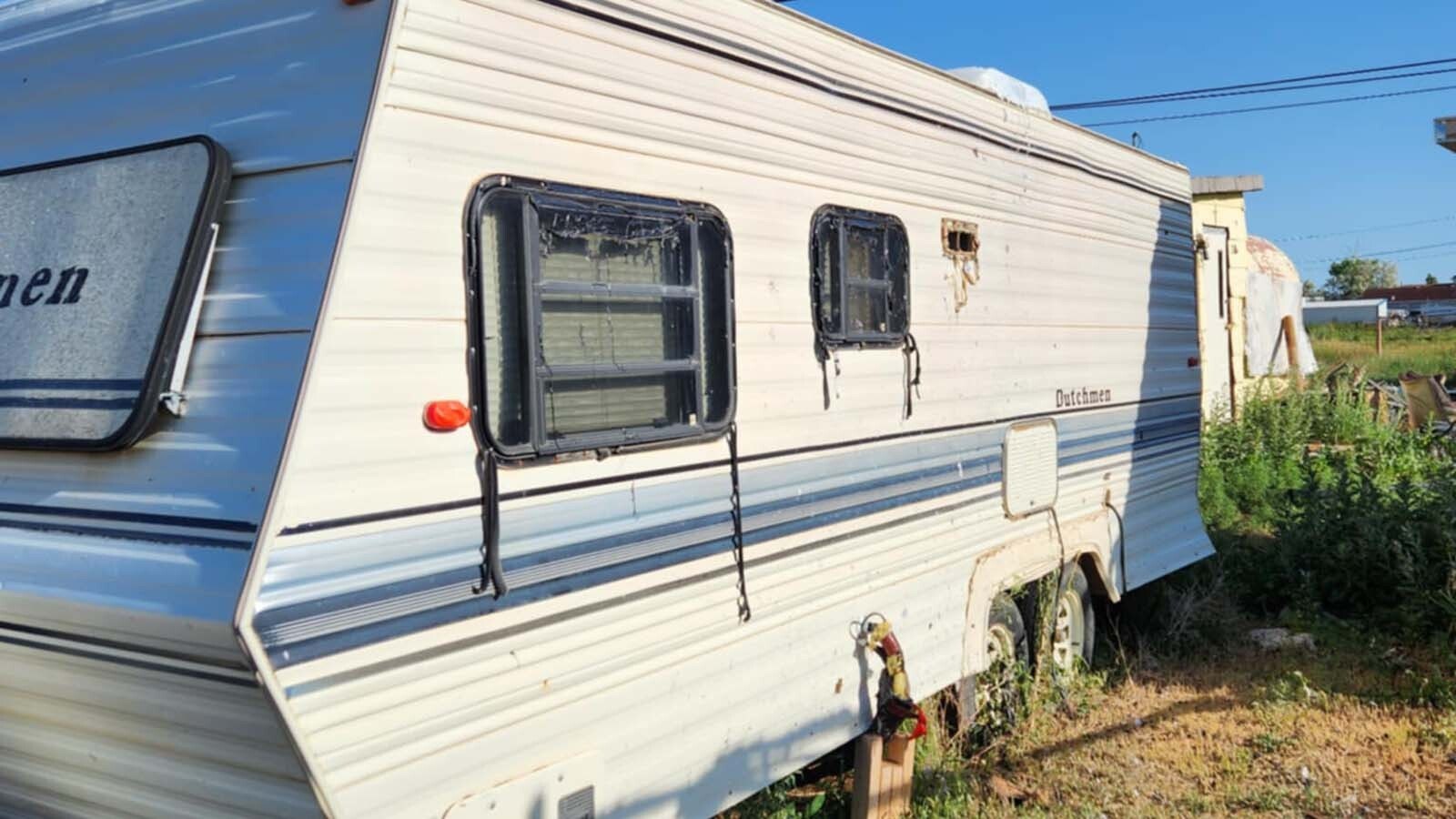 A fire that destroyed a man’s home and storage shed just south of Laramie late Friday also damaged a nearby camper and vehicle.