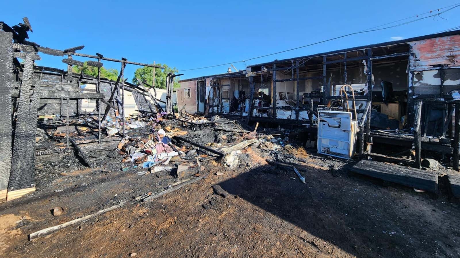 A fire thought to have been ignited by fireworks late Friday destroyed the trailer home and storage shed of Dennis Wheeler on Fort Sanders Road, just south of Laramie. Wheeler’s son, Kyle Wheeler, pulled him out just before the entire home went up in flames.