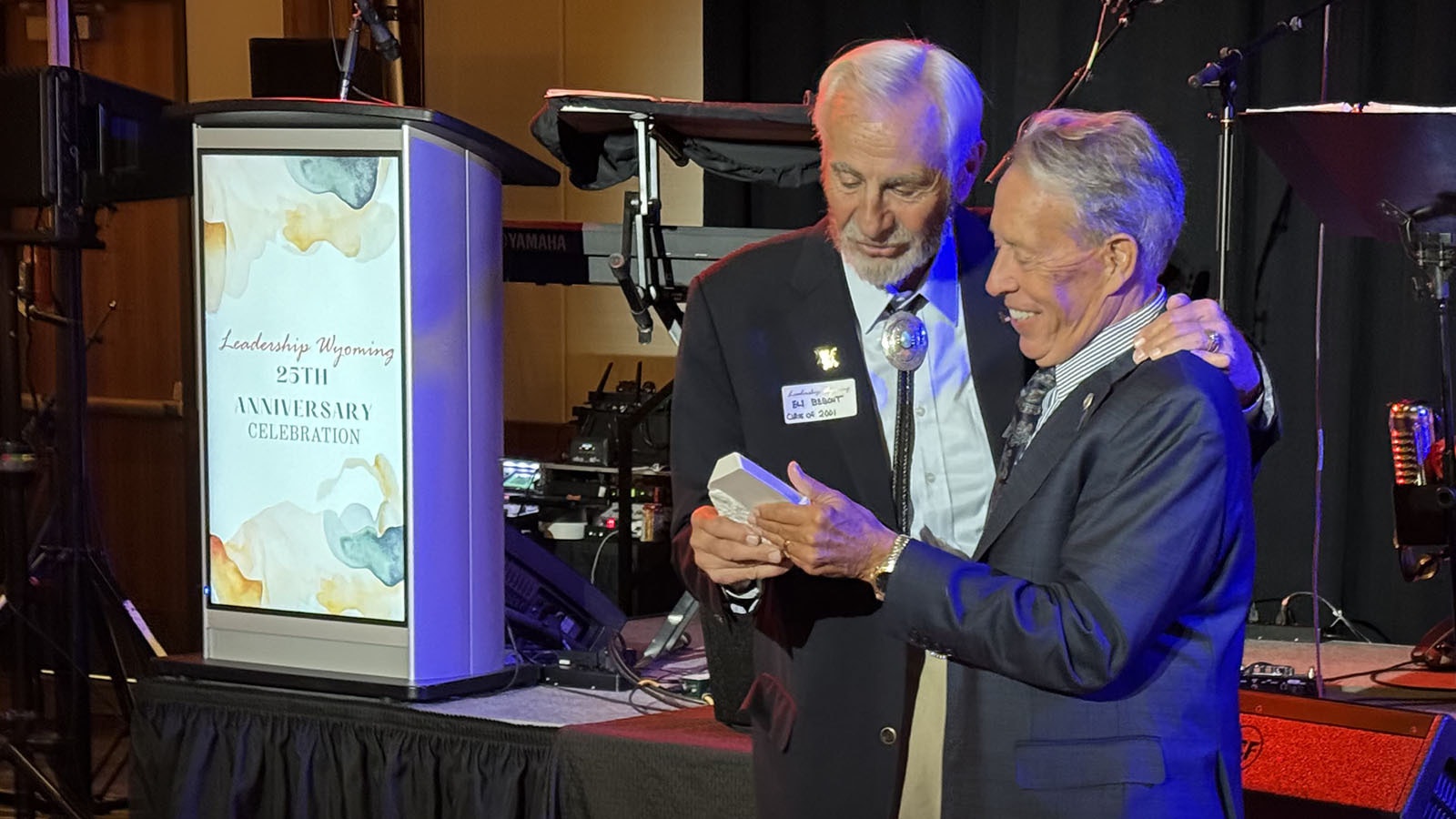 Bill Schilling and Eli Bebout embrace each other during Leadership Wyoming's 25th Anniversary. Schilling and Bebout worked together to establish the first program in 2000. Leadership Wyoming recenlty celebrated its 25th anniversary in Laramie with a showing of about 500 current and former graduates. The program is shaping the Cowboy State's next wave of pioneers.