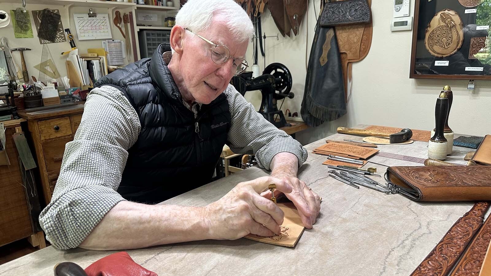 Master Leather Craftsman James “Jim” Jackson of Sheridan, Wyoming, is known world wide for his leather work. He is a master craftsmen who trained under Don King and other legends in the world of leather work, including his own father. For the past eight seasons, he has invited people into his workshop at the Brinton Museum in Big Horn, Wyoming and has mentored others as far away as Japan.