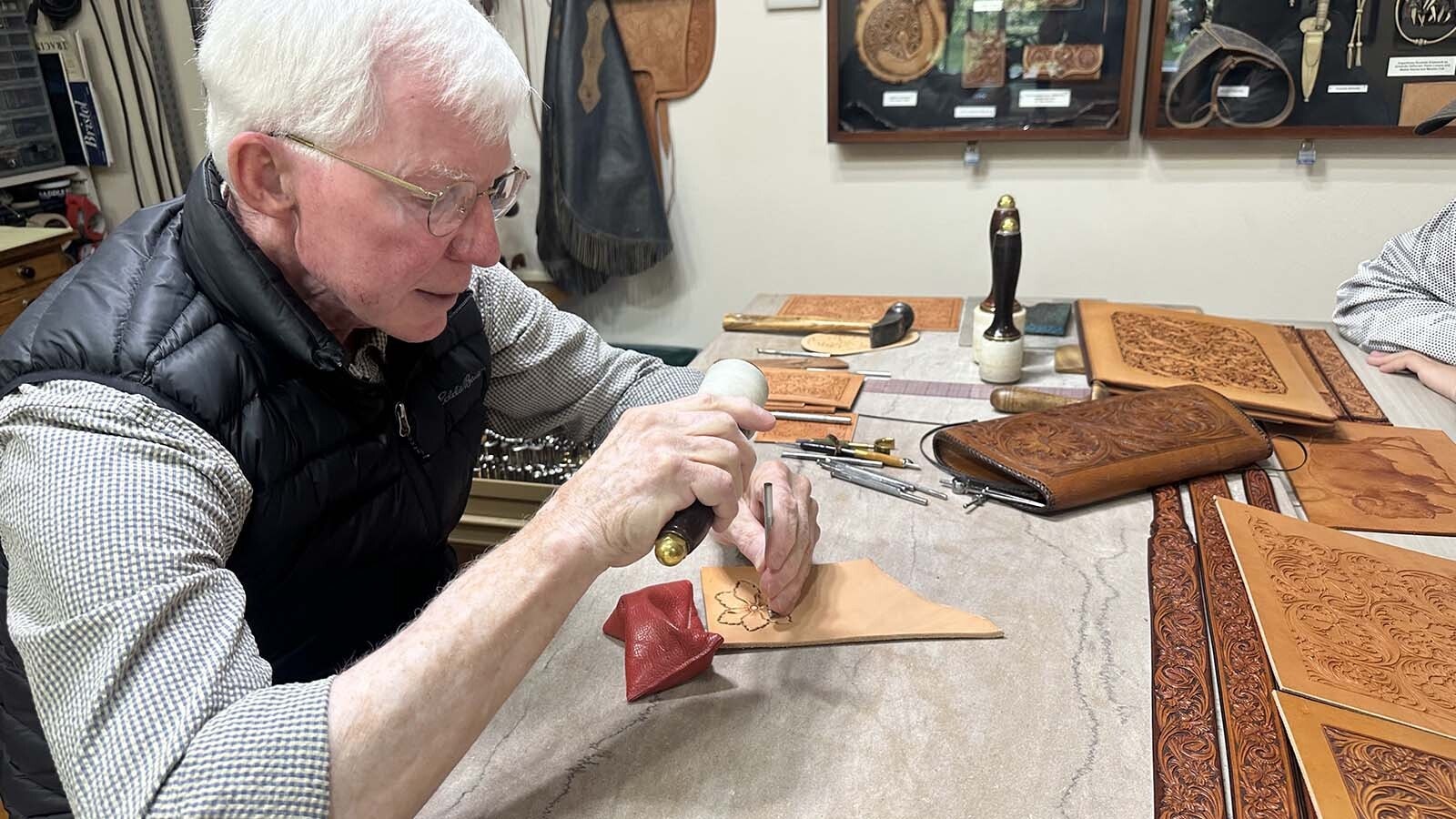 Master Leather Craftsman James “Jim” Jackson of Sheridan, Wyoming, is known world wide for his leather work. He is a master craftsmen who trained under Don King and other legends in the world of leather work, including his own father. For the past eight seasons, he has invited people into his workshop at the Brinton Museum in Big Horn, Wyoming and has mentored others as far away as Japan.