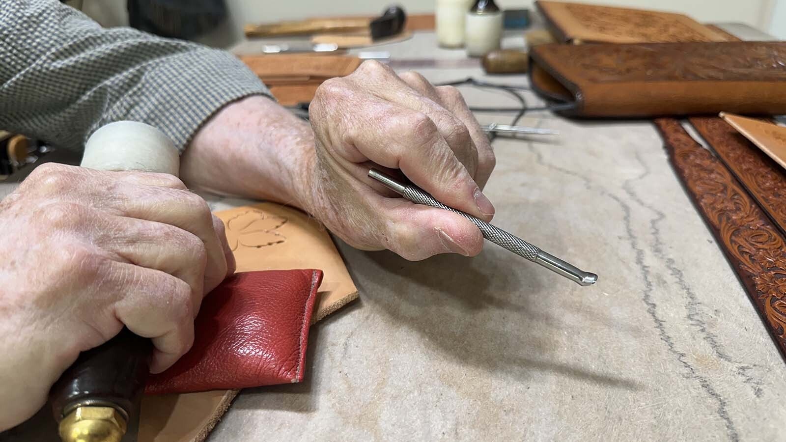 Master Leather Craftsman Jackson of Sheridan, Wyoming, has been making leather designs since he was a teenager. In the early days, he had to make his own tools which he still uses to this day. He also now uses store bought tools as well. Each tool has a purpose, from stamping to fine shading work, which Jackson uses to create his unique pieces of art.