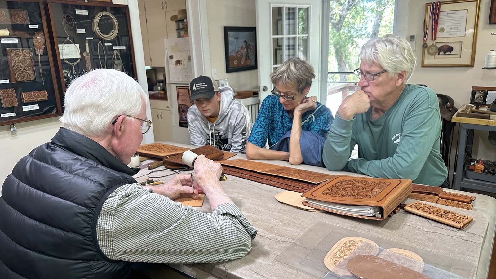 Master Leather Craftsman Jackson has a leather shop at the Brinton Museum in Big Horn, Wyoming where he has been working since “retirement.” The artist was trained in several different mediums including leather design by such legends as Don King of Kings Saddlery in Sheridan. Jackson enjoys sharing the process with his audiences and invites visitors of all ages to his workshop.