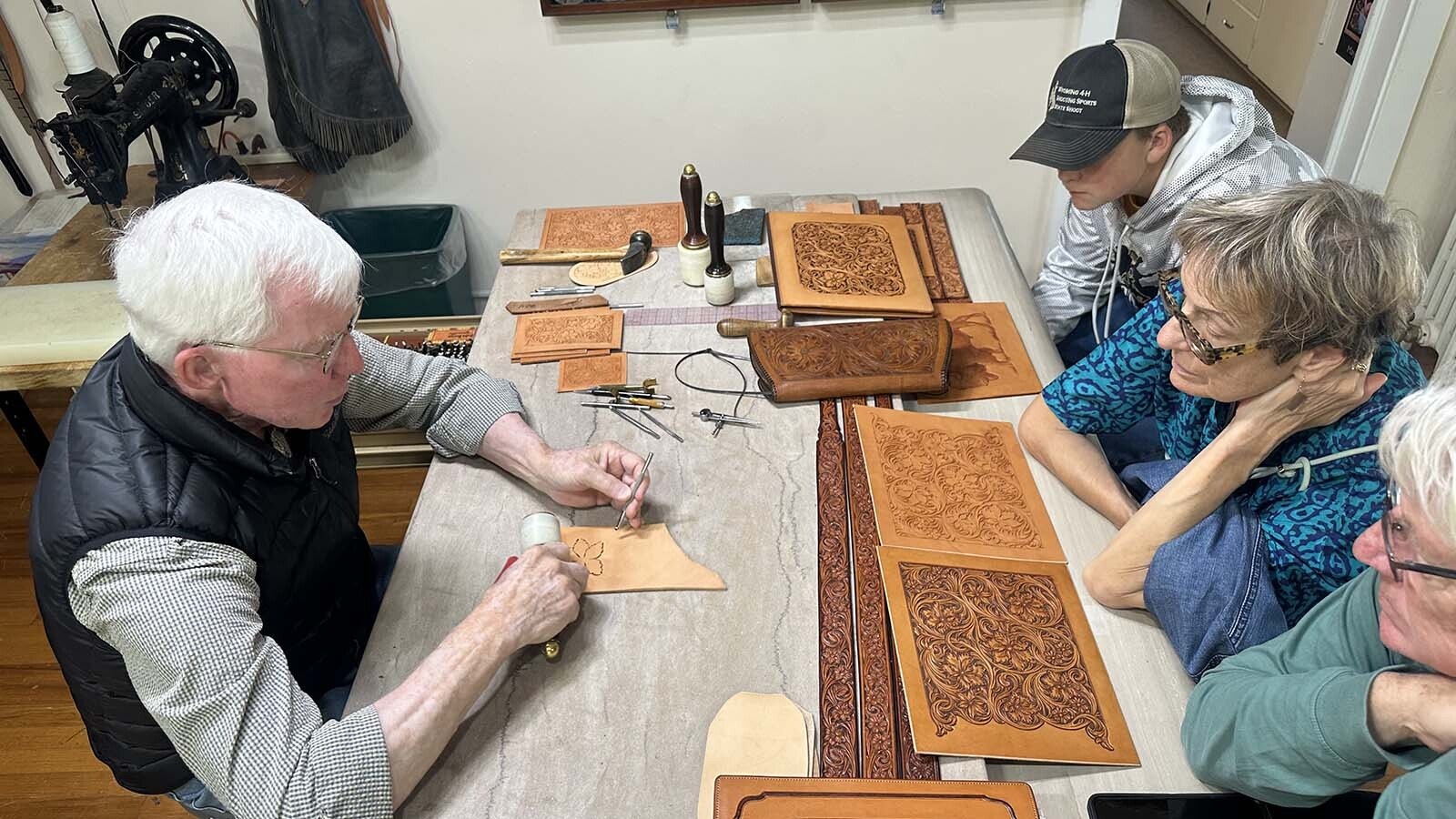 Master Leather Craftsman “Jim” Jackson of Sheridan, Wyoming, is known world wide for his leather work. He is a master craftsmen who trained under Don King and other legends in the world of leatherwork, including his own father. For the past eight seasons, he has invited people into his workshop at the Brinton Museum in Big Horn, Wyoming and has mentored others as far away as Japan.