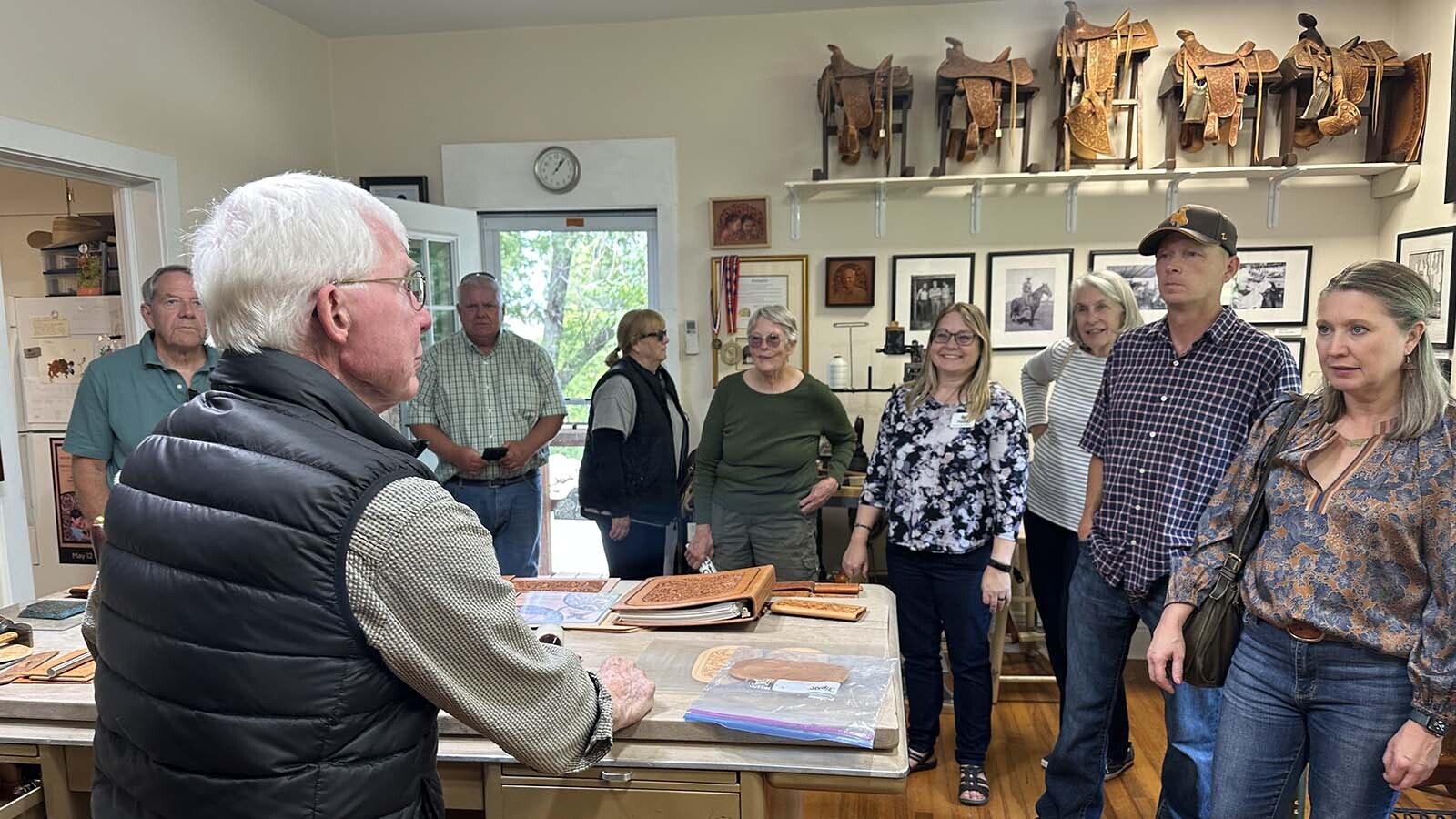 James “Jim” Jackson of Sheridan, Wyoming, originally trained as an artist at the University of Wyoming. He now combines his paintings with his leather designs for a surprising twist.