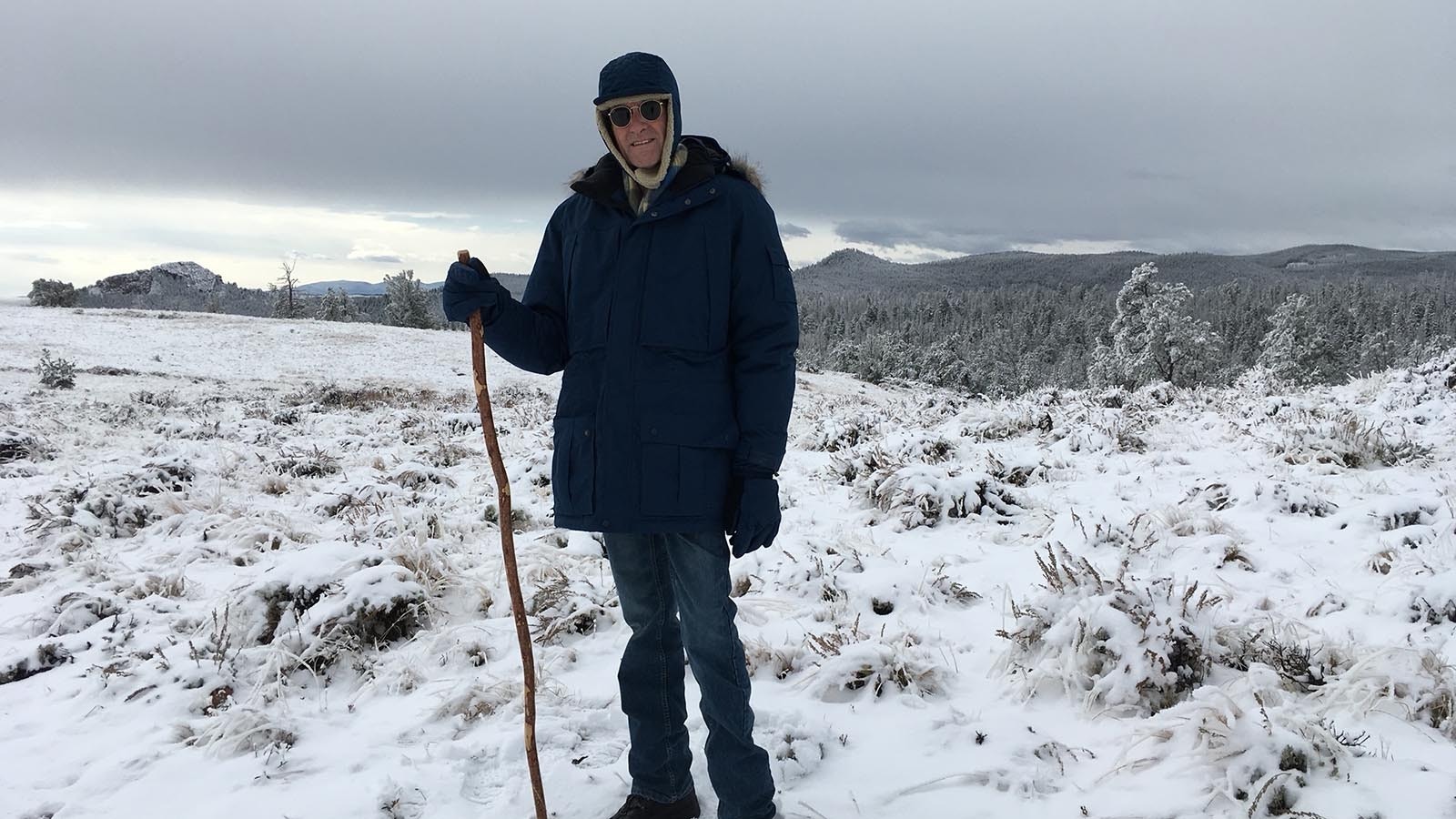 Jim Grant, who goes by the pen name Lee Child for his Jack Reacher novels, hiking in the winter snow in the foothills above the Laramie Plains near his Tie Siding home.