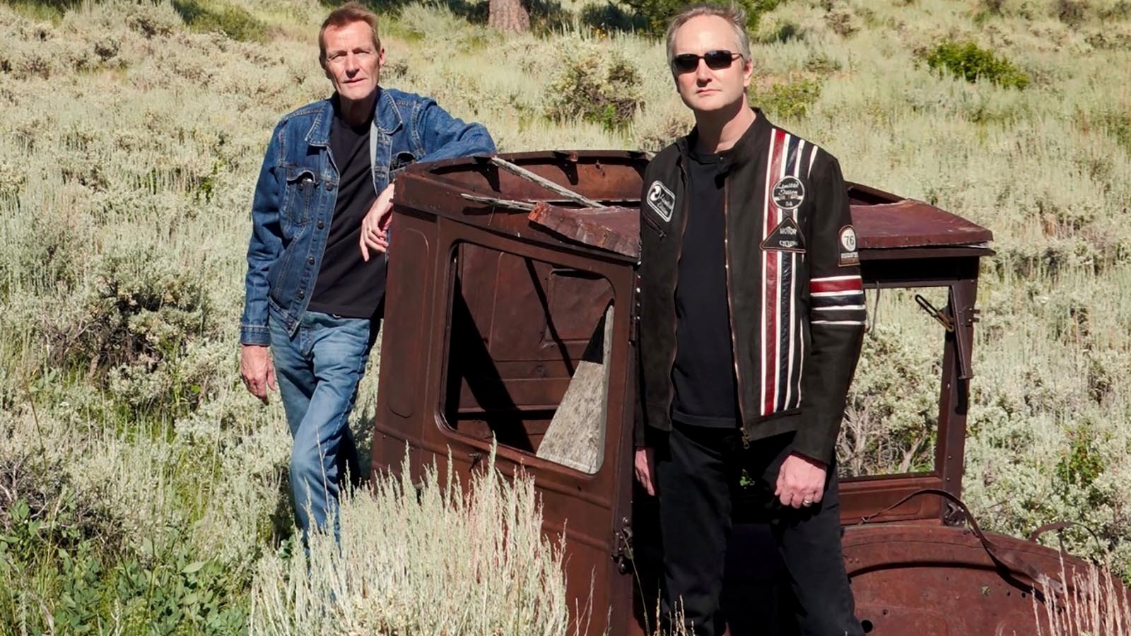 Lee Child, left, the pen name for Jim Grant, writes the thriller Jack Reacher novels, and his younger brother, Andrew, who is in the process of taking over the writing of the books. They are standing next to an abandoned Model T produced by the Ford Motor Co. over a century ago, near where they live on the Fish Creek Ranch Preserve south of Tie Siding in Albany County.