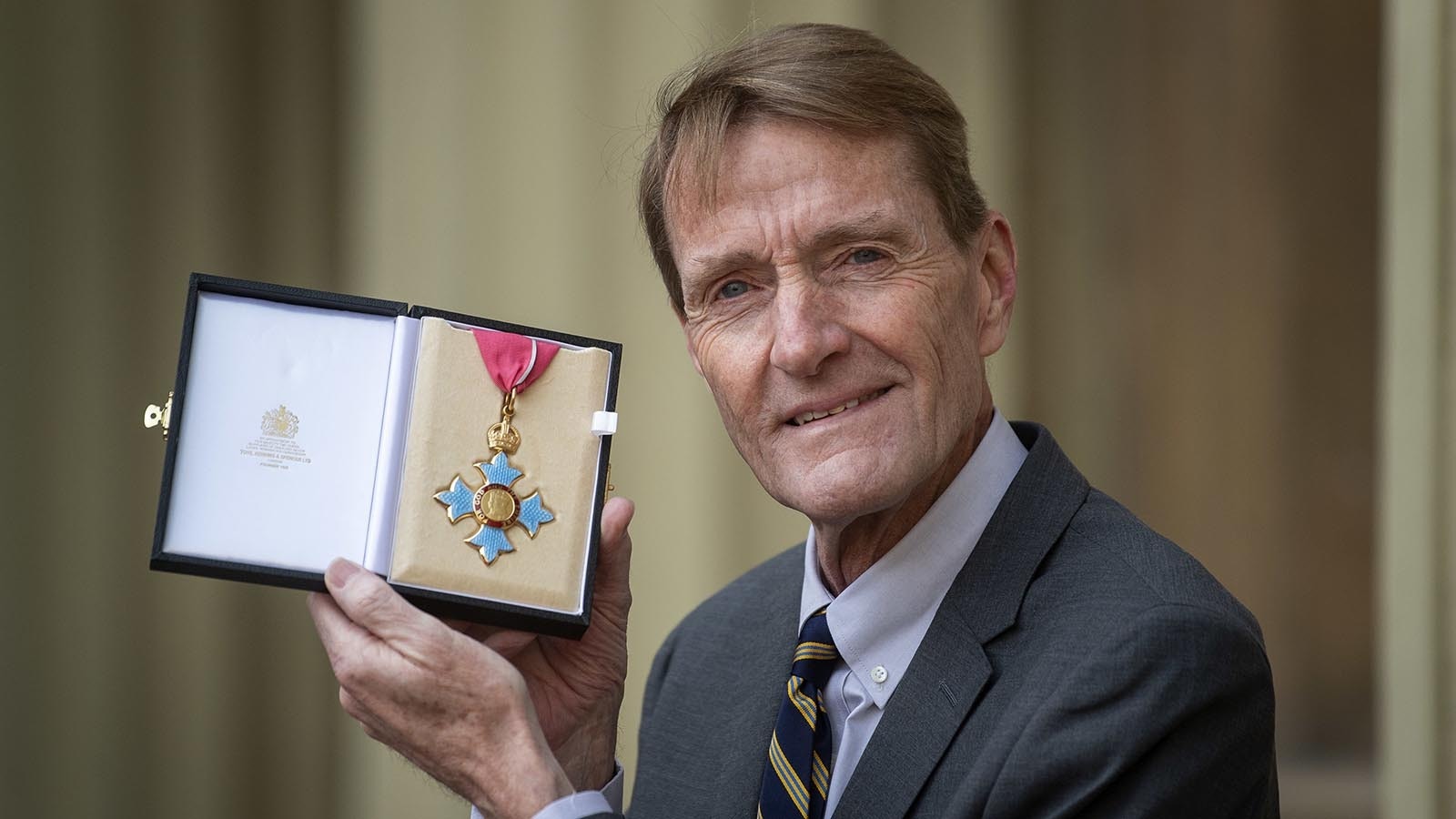 Author Lee Child, real name James Grant, who wrote the Jack Reacher novels, with his Commander of the Most Excellent Order of the British Empire for services to literature.