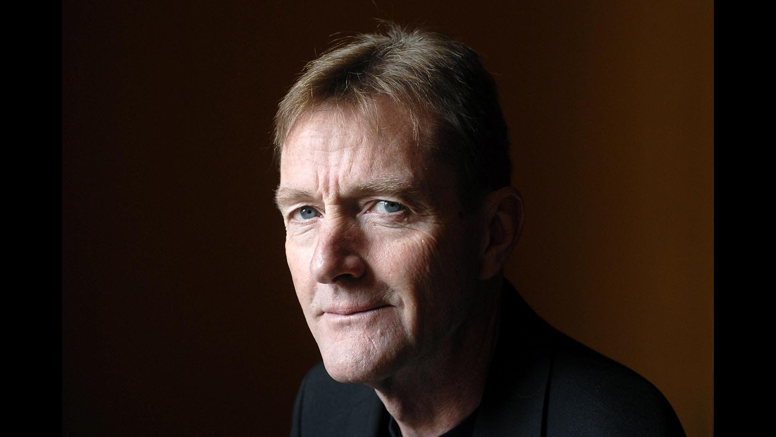 Authro Lee Child, real name James Grant.