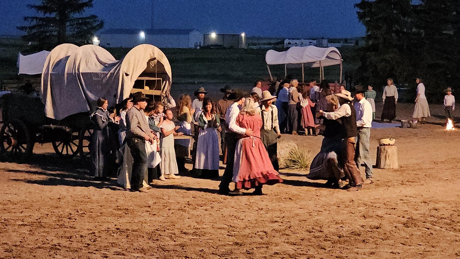 A square dance begins to celebrate the halfway point to California during Legend of Rawhide.