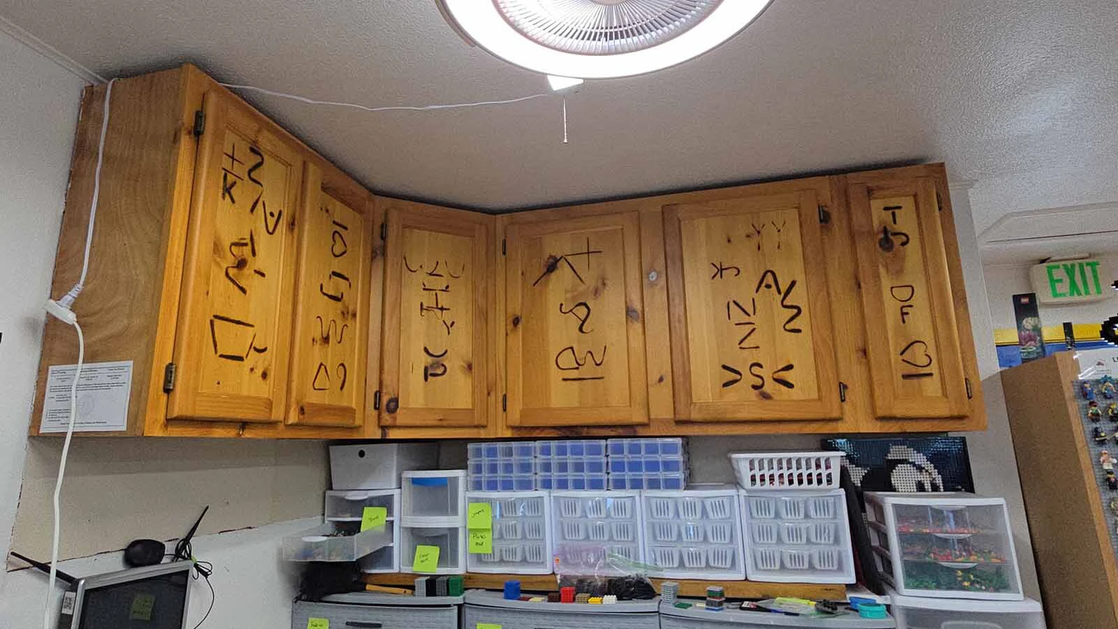 The brands on the cabinets are the only thing remaining from the bar the Wyoming BrickWorks store used to be. The family decided to keep those for their history.