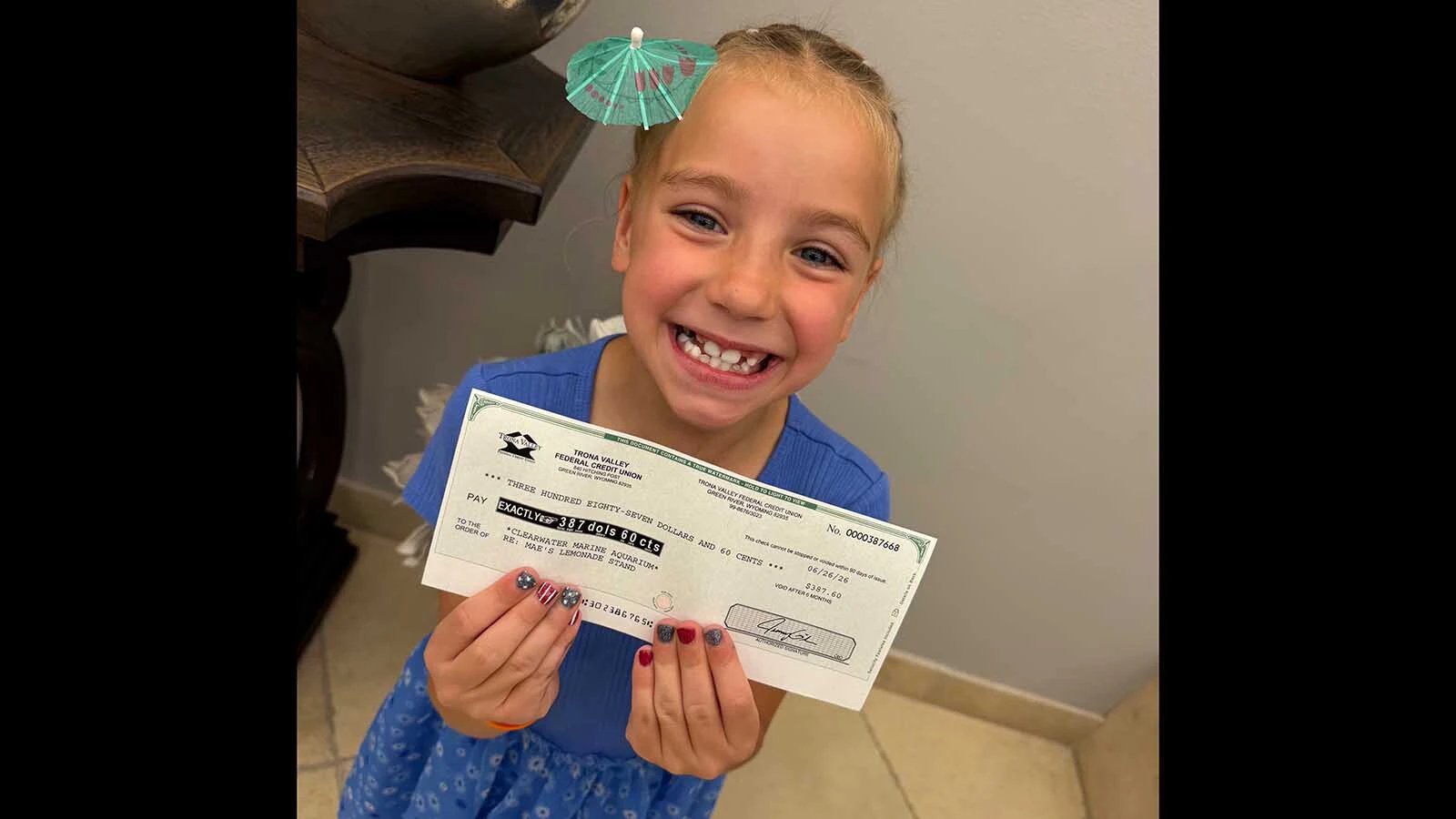 Maelie Teuscher, 6, is one of the Sweetwater County kids getting some brisk business from thirsty Sweetwater County Sheriff's Office deputies this summer.