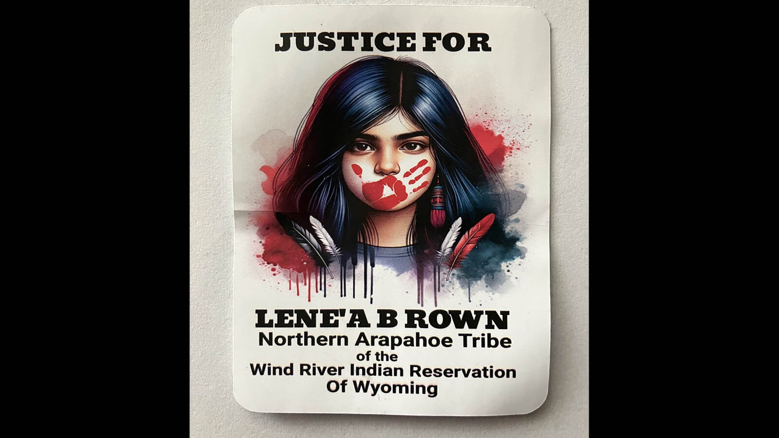 As part of his efforts to honor his daughter, David Henrikson has had “Justice For Lene’a Brown” stickers printed with a red handprint over her mouth, a symbol for missing and murdered indigenous women.