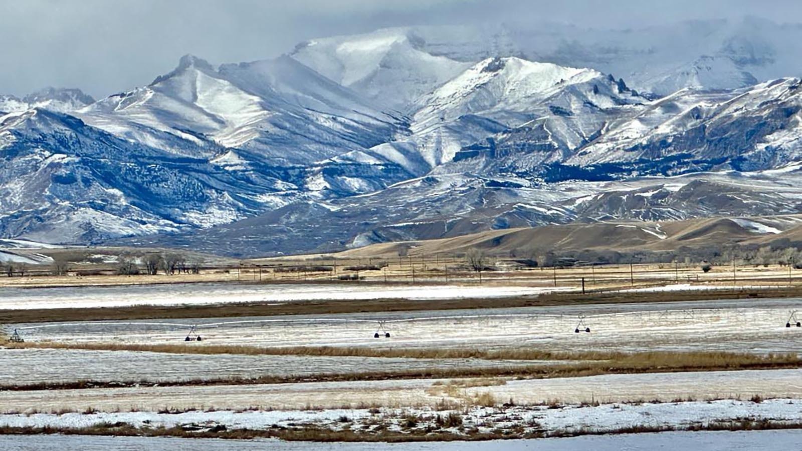 Upper Sunshine Reservoir with a view of the Absaroka mountains.