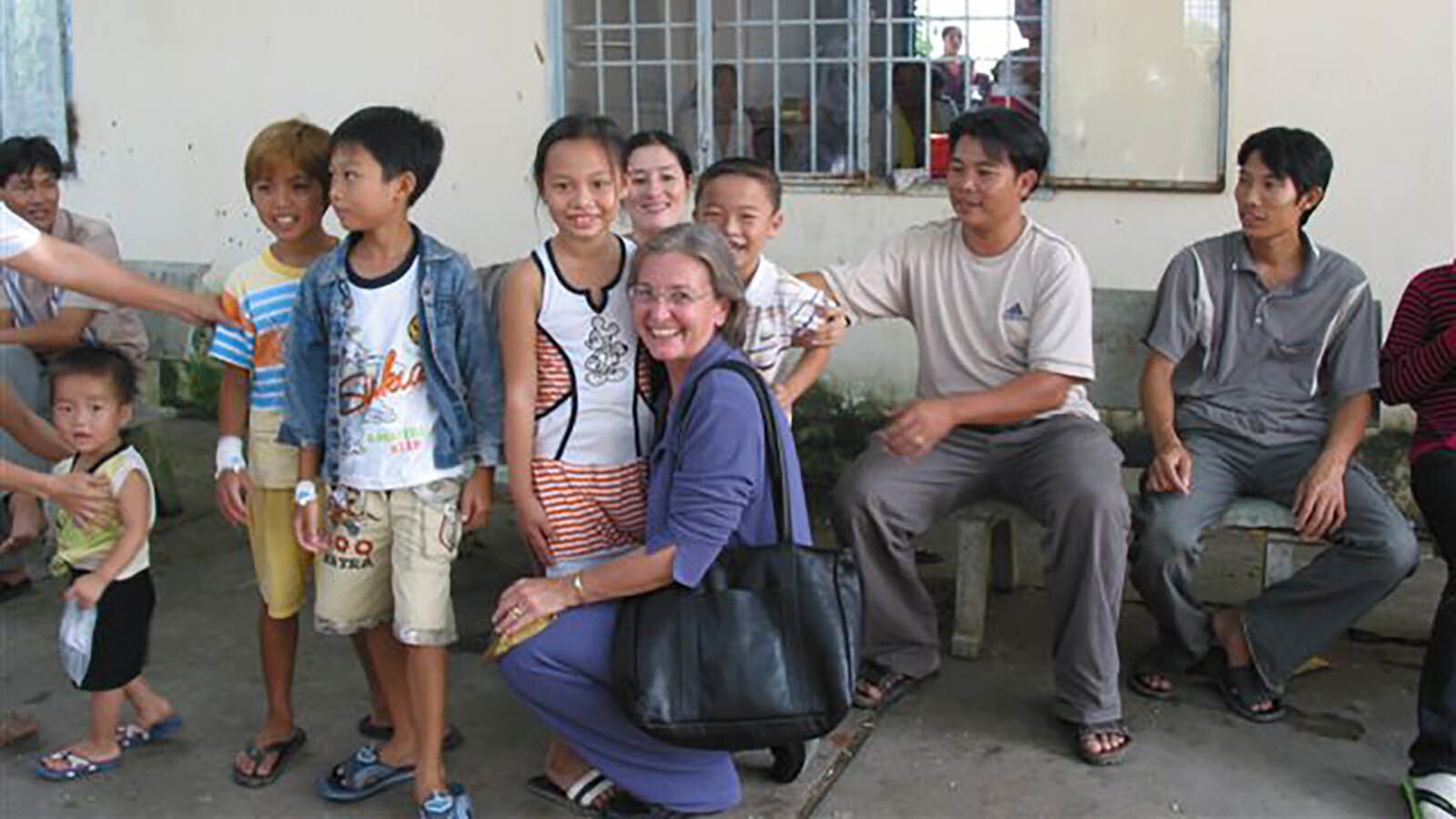 Leslie Hagenstein with some of her patients in Vietnam.