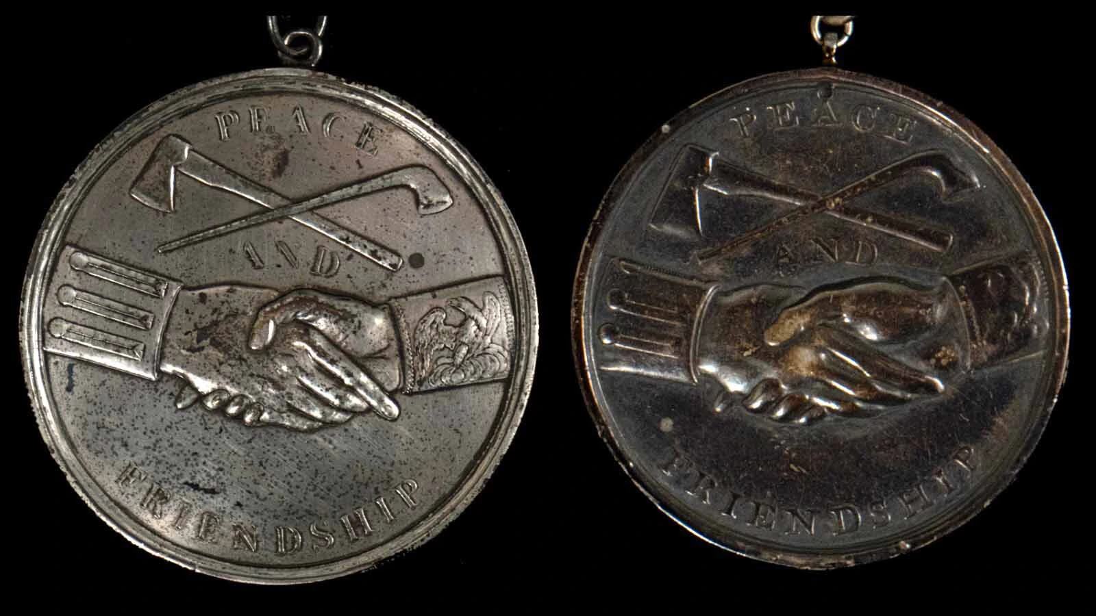 The backs of the two rare Jefferson peace medals given out during the 1804 Lewis and Clark expedition in the Buffalo Bill Center of the West's collection.