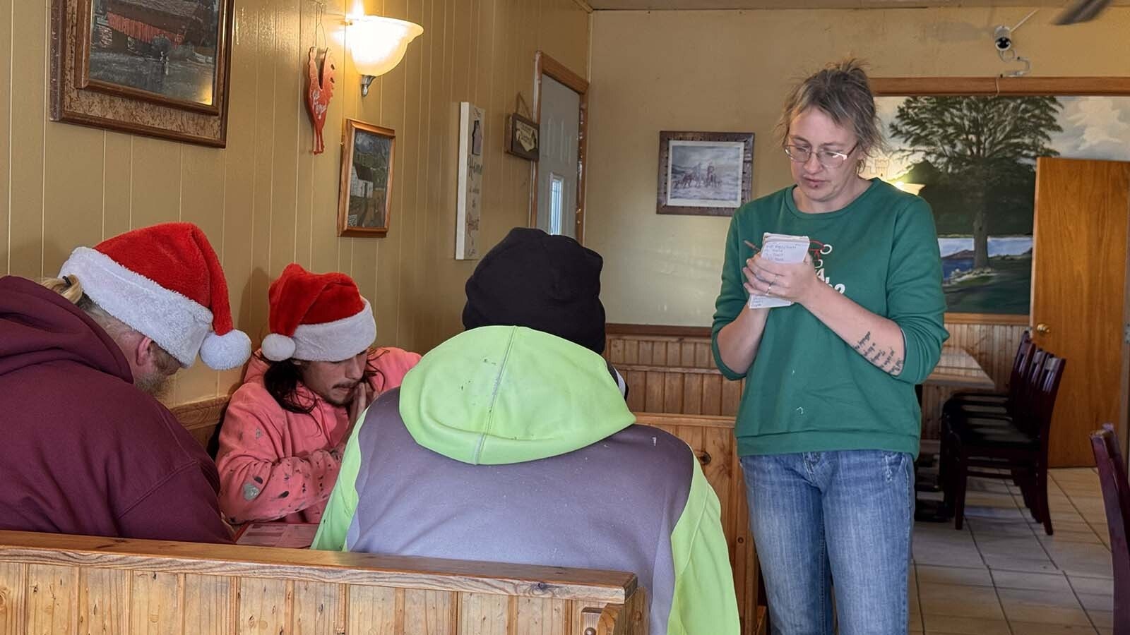 Molly Kallos takes an order at Farmer's Cafe in Lexington, Nebraska.