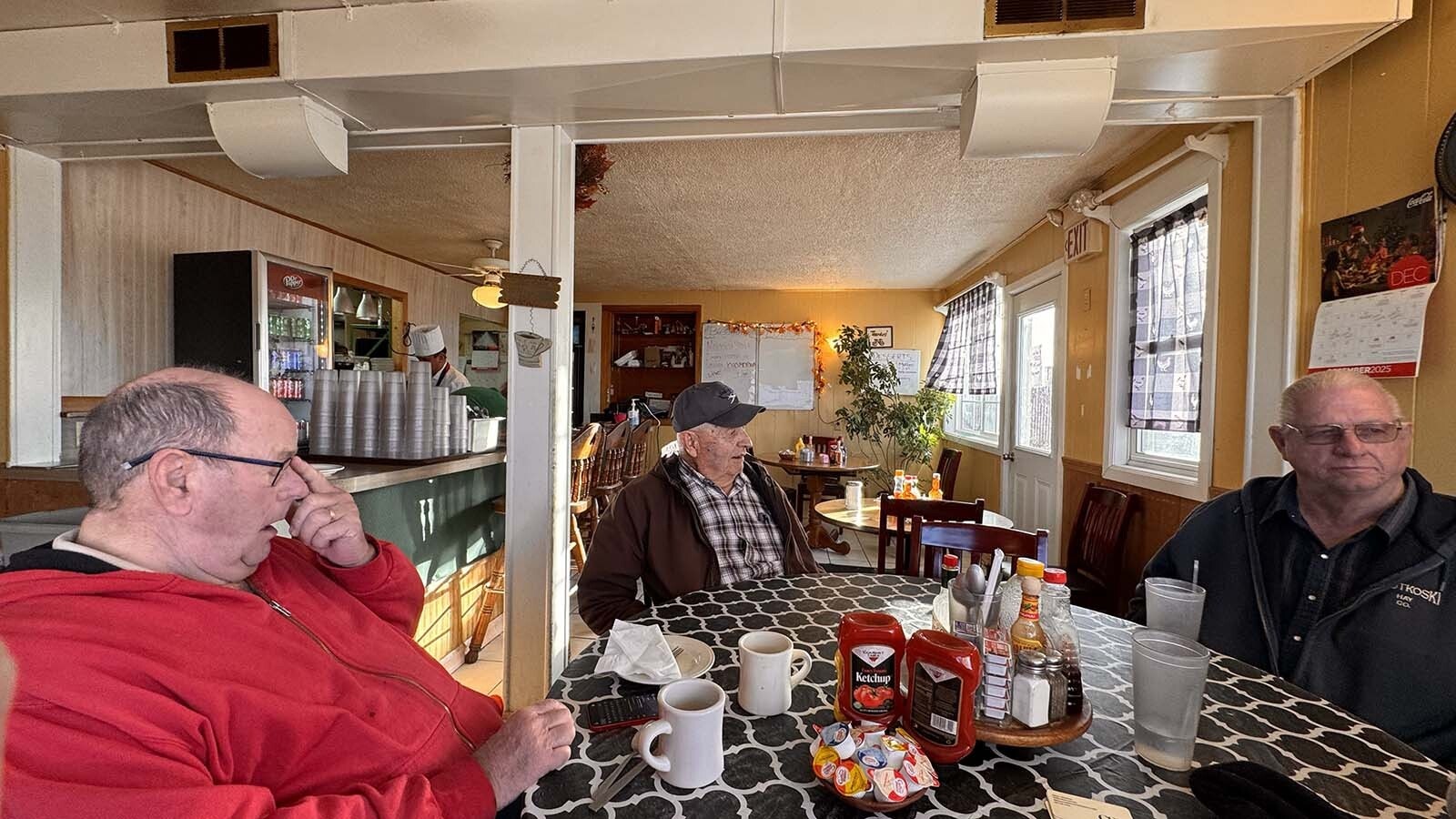 The old guys club at Farmer's Cafe include, from left, Dave Giesbrecht, Lorin Bremer and Paul Bernston.