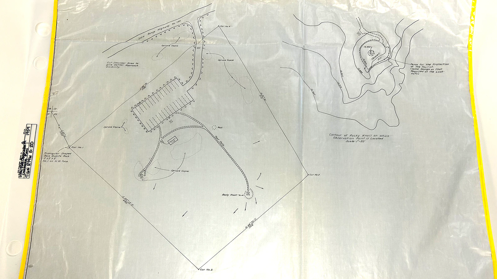 Engineering blueprints from 1959 show plans for a parking area, footpath, restroom and the stone observation tower visitors see today.