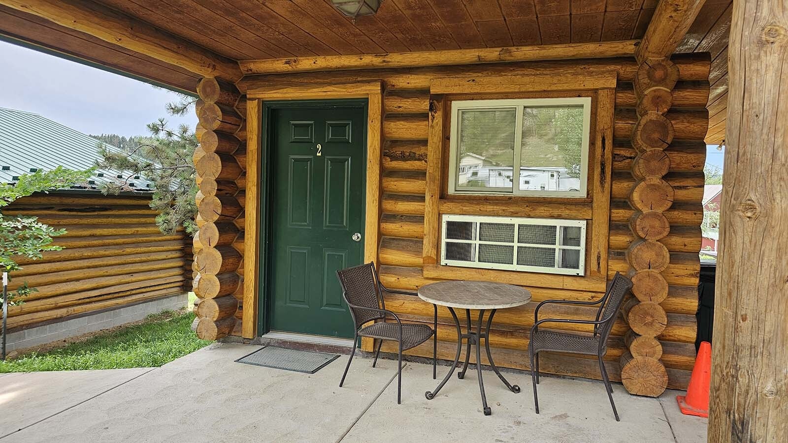 Each cabin at Liberty Belle Lodge in Aladdin includes a place to sit outside.