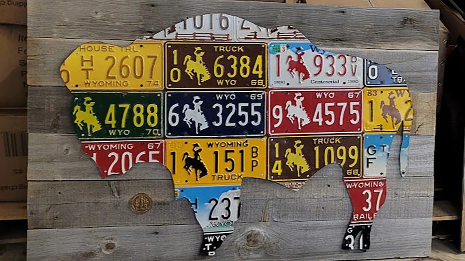 A buffalo art piece composed of all Wyoming license plates from various areas captures the color that Rob Piotter's license plate art produces.