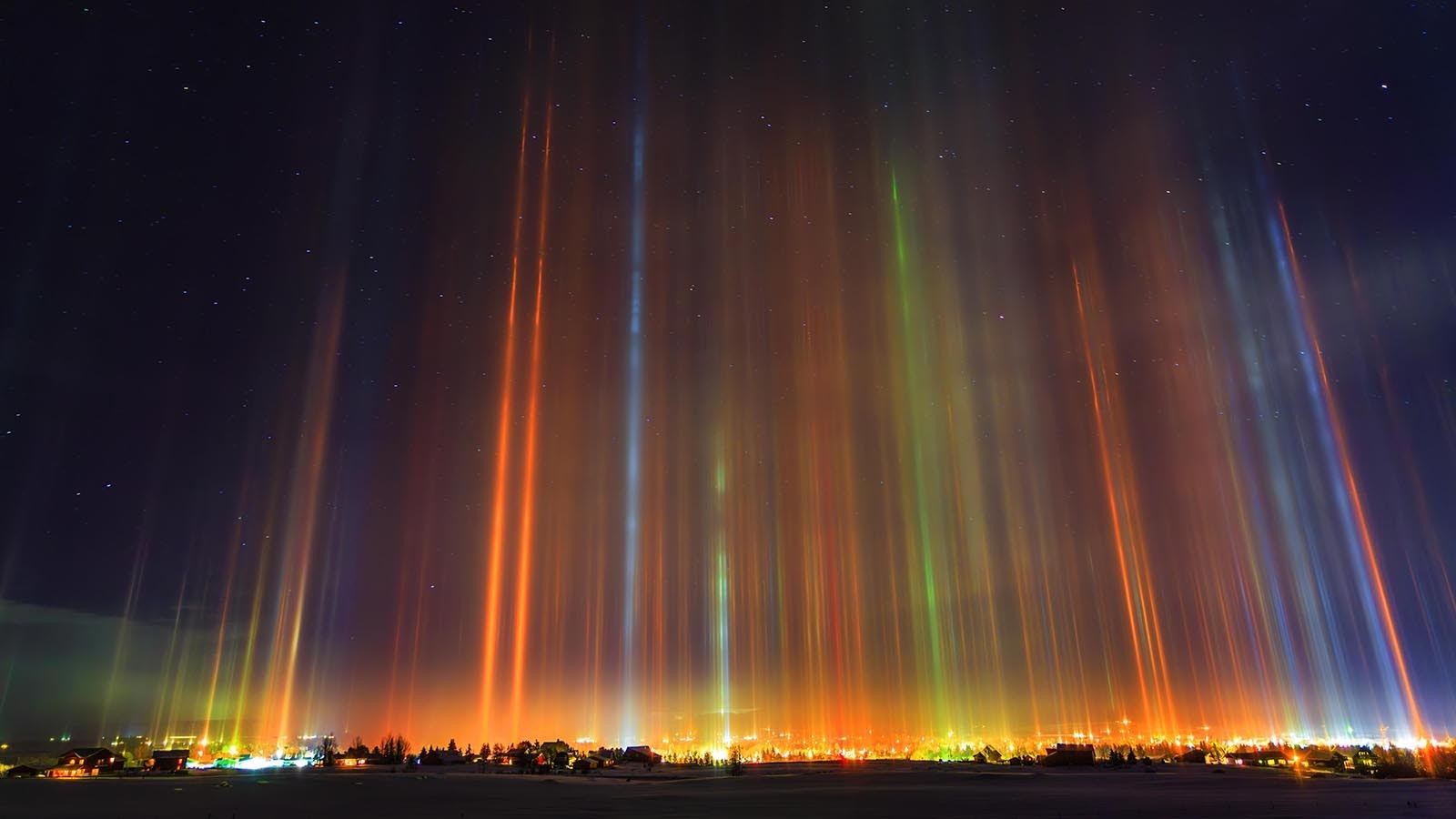 Pinedale photographer Dave Bell says one of his most talked about photos was of light pillars in a cold Wyoming sky in 2017.