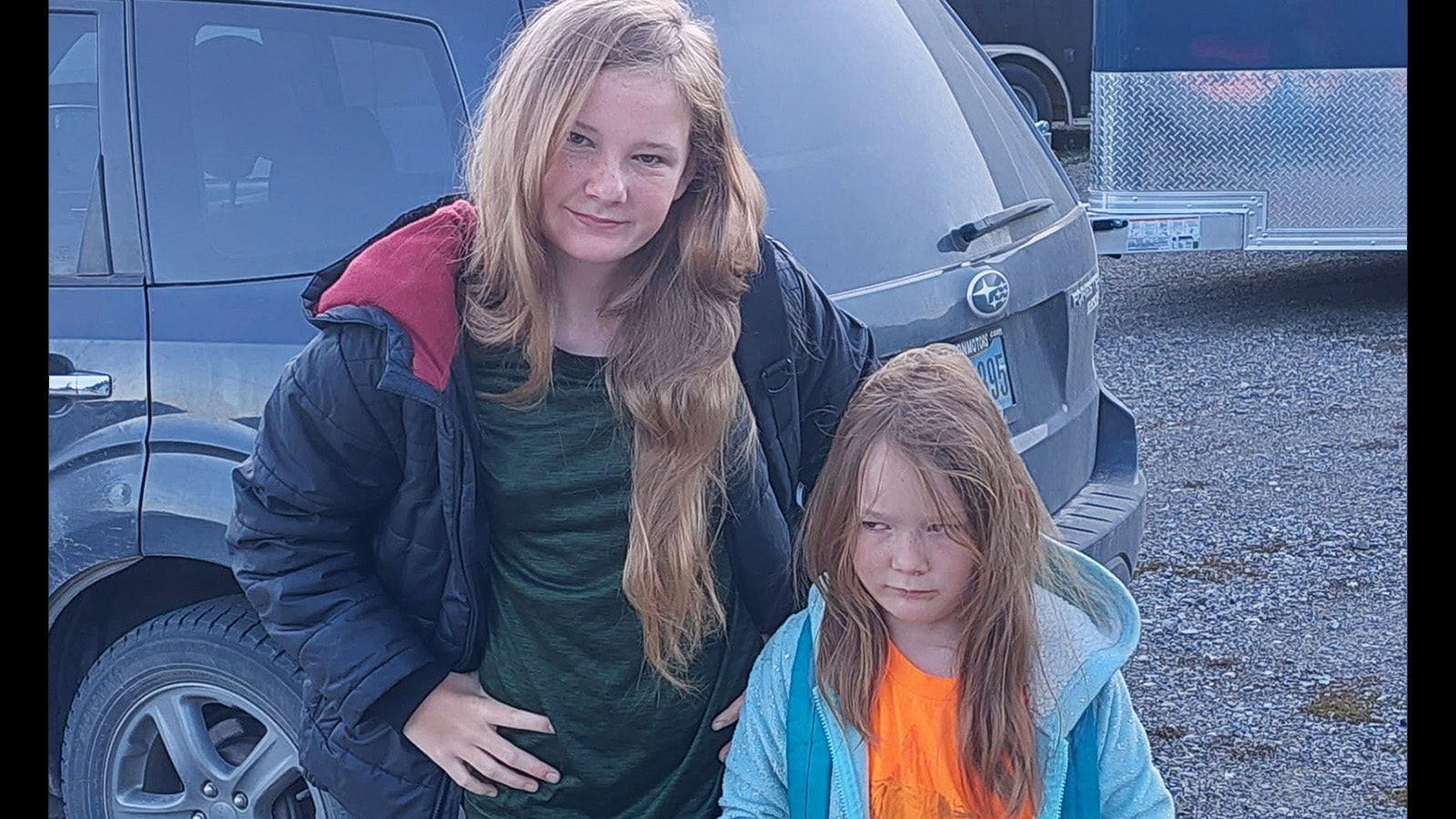 A pair of Wyoming girls missing for 74 days after their mother took them from home in February have been found safe and reunited with their father. This photo is from the poster asking people to look out for the girls.
