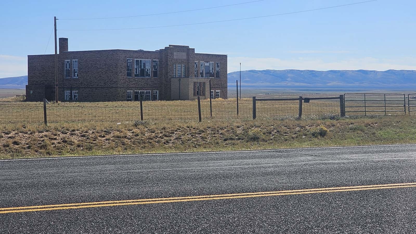 The school in Bosler has been abandoned, its windows broken out.