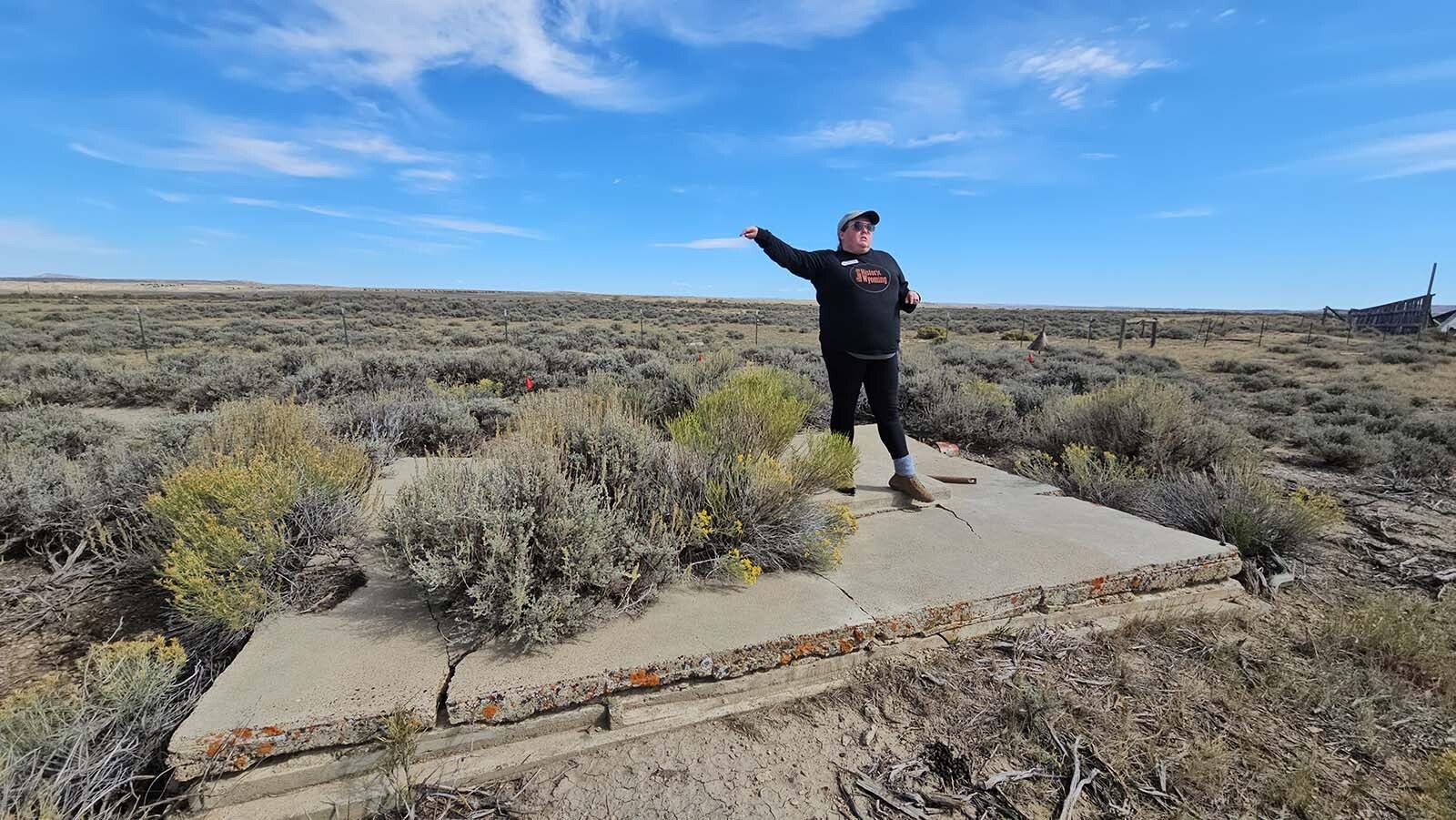 Megan Stanfill, executive director of the Alliance for Historic Wyoming, talks about the Medicine Bow Airport during the Lincoln Highway "Unbarred" tour.
