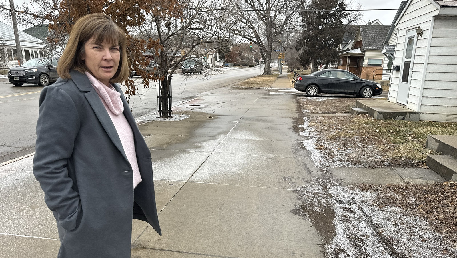 Lisa Mueller is a real estate agent with MC2 Collaborative in Sheridan less than a block from 58 5th St. where Sgt. Nevada Krinkee was killed. She said she heard first one, then four more gunshots, and saw police chase as suspect east.