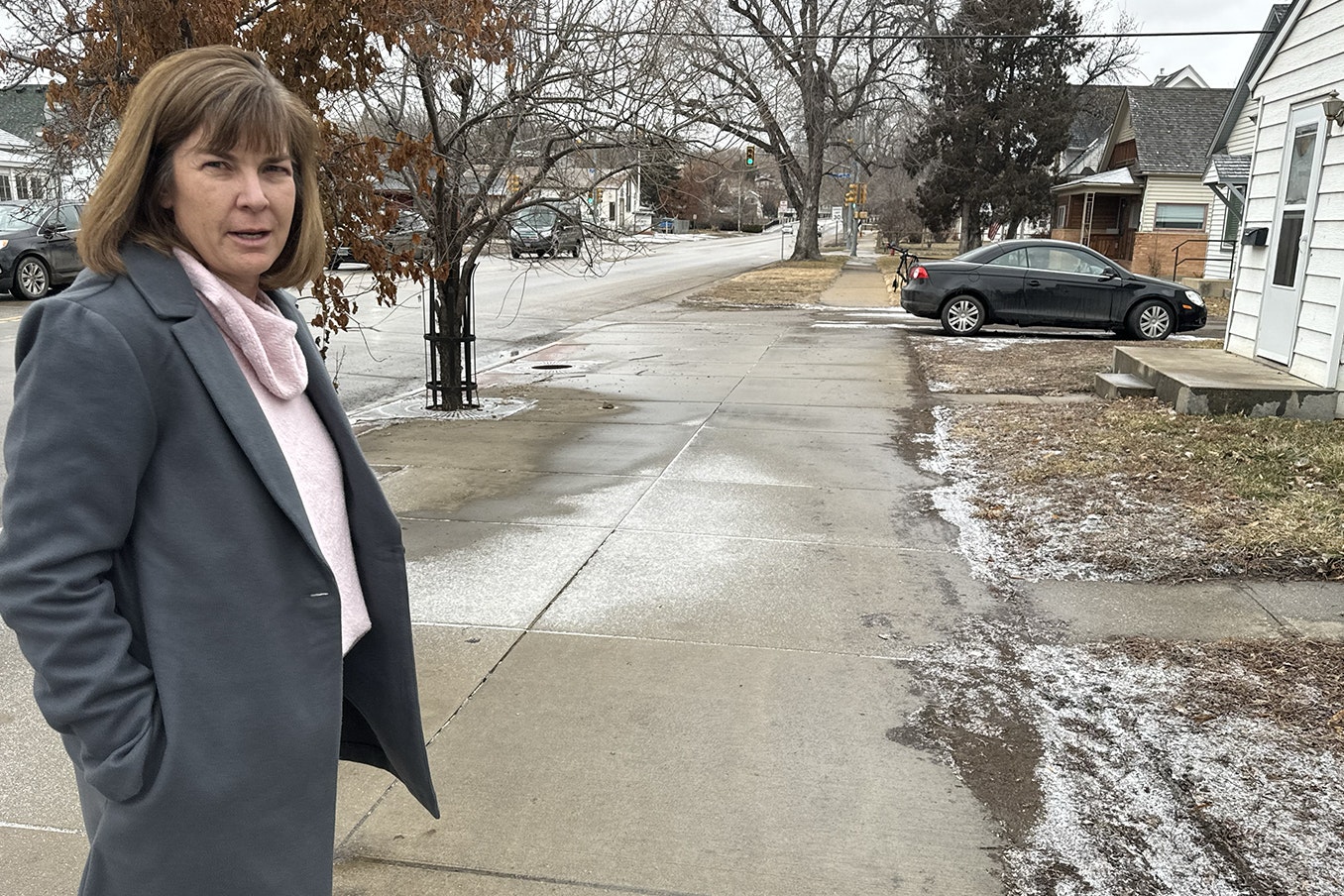 Lisa Mueller is a real estate agent with MC2 Collaborative in Sheridan less than a block from 58 5th St. where Sgt. Nevada Krinkee was killed. She said she heard first one, then four more gunshots, and saw police chase as suspect east.