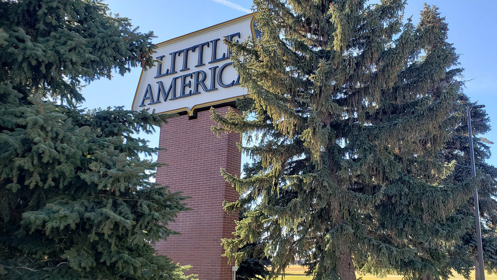 Despite being surrounded by large, mature trees, Little Americas sign is readily visible from the highway.