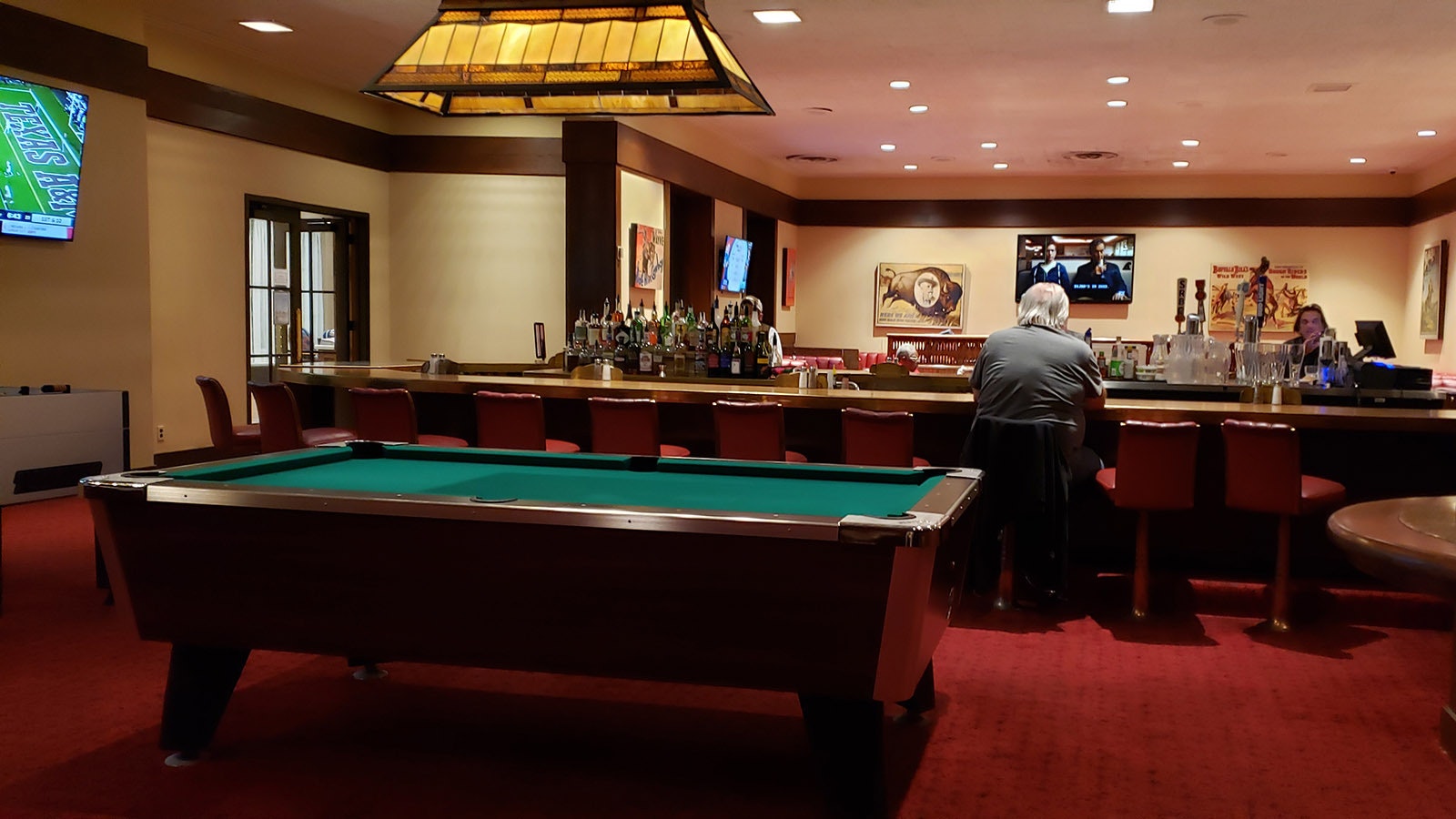 Pool tables and the bar inside Little America.