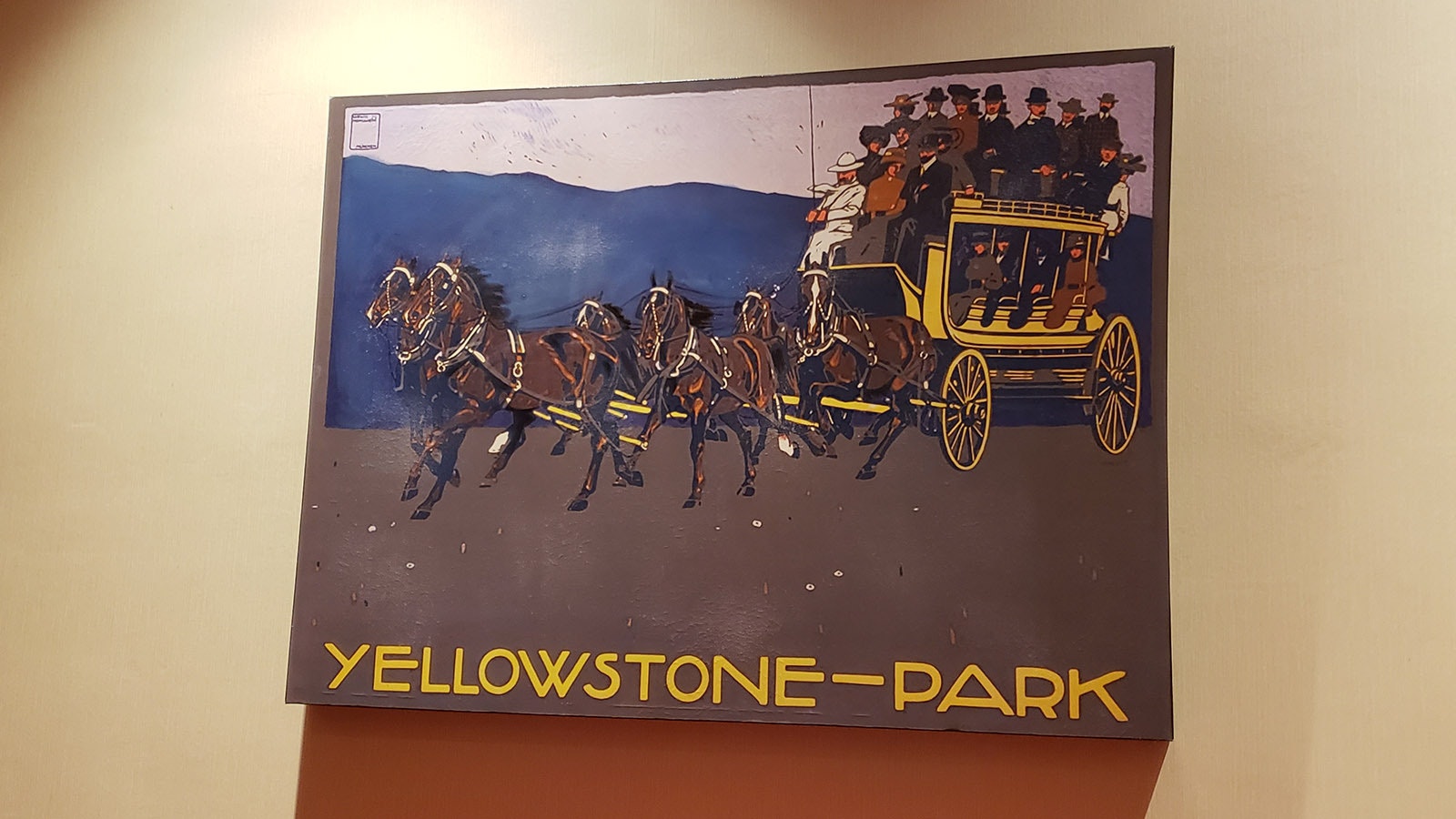 A Yellowstone Park billboard hanging on the wall at Little America.