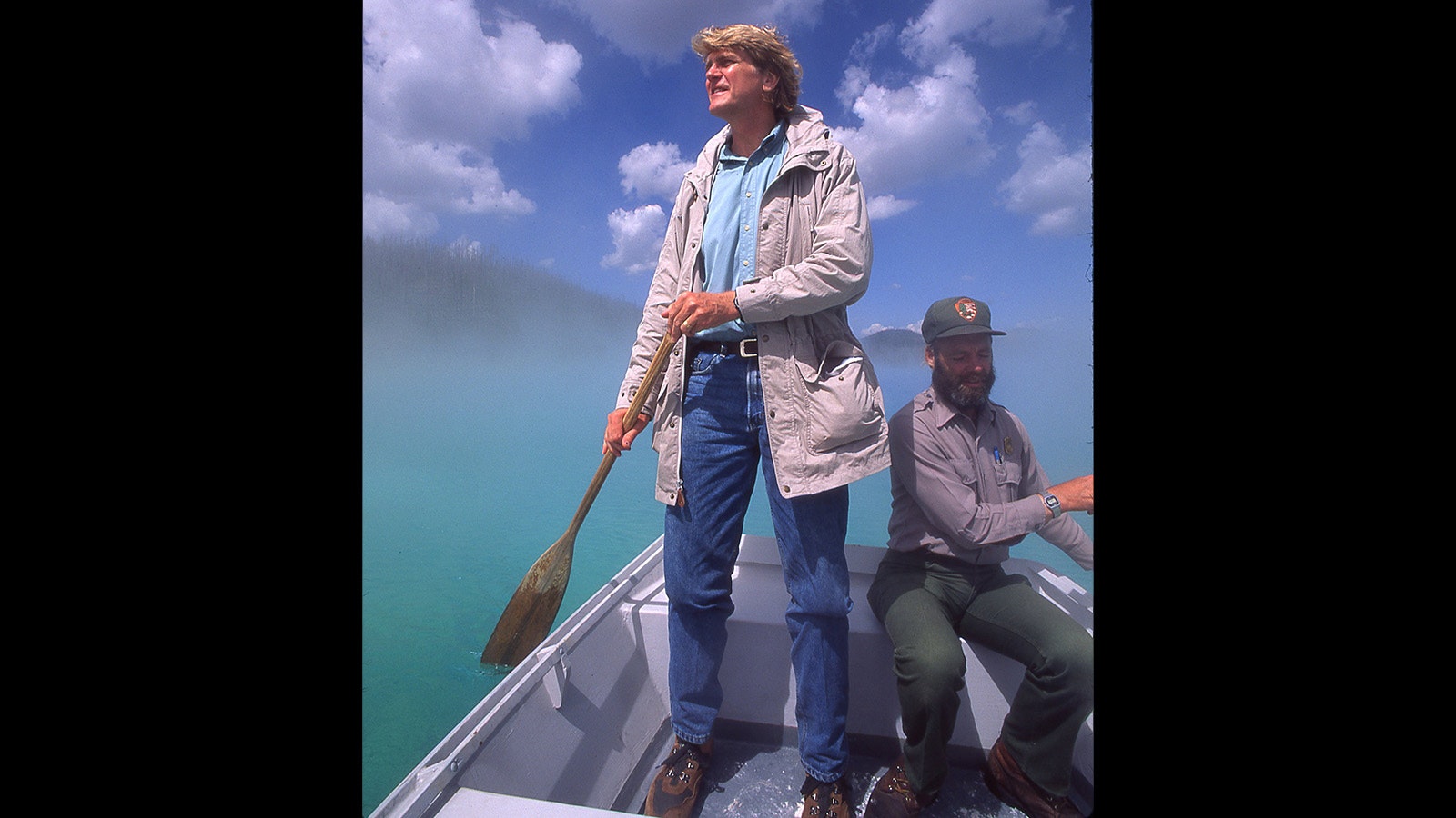 Boyd Mattson of National Geographic, left, and Rick Hutchinson on Grand Prismatic Spring in the specially designed Little Dipper boat.