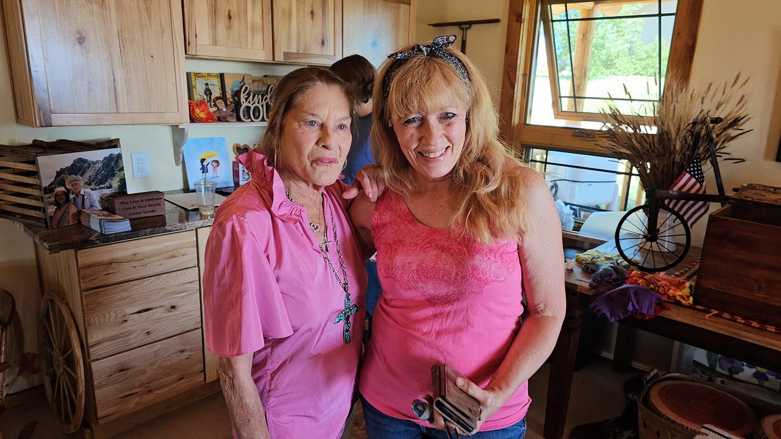 Cheryl Gowdy poses with Wendy Zynda. Her father knew Cheryl's father Curt Gowdy. Zynda's father and Gowdy worked together to help bring youth baseball to Cheyenne.