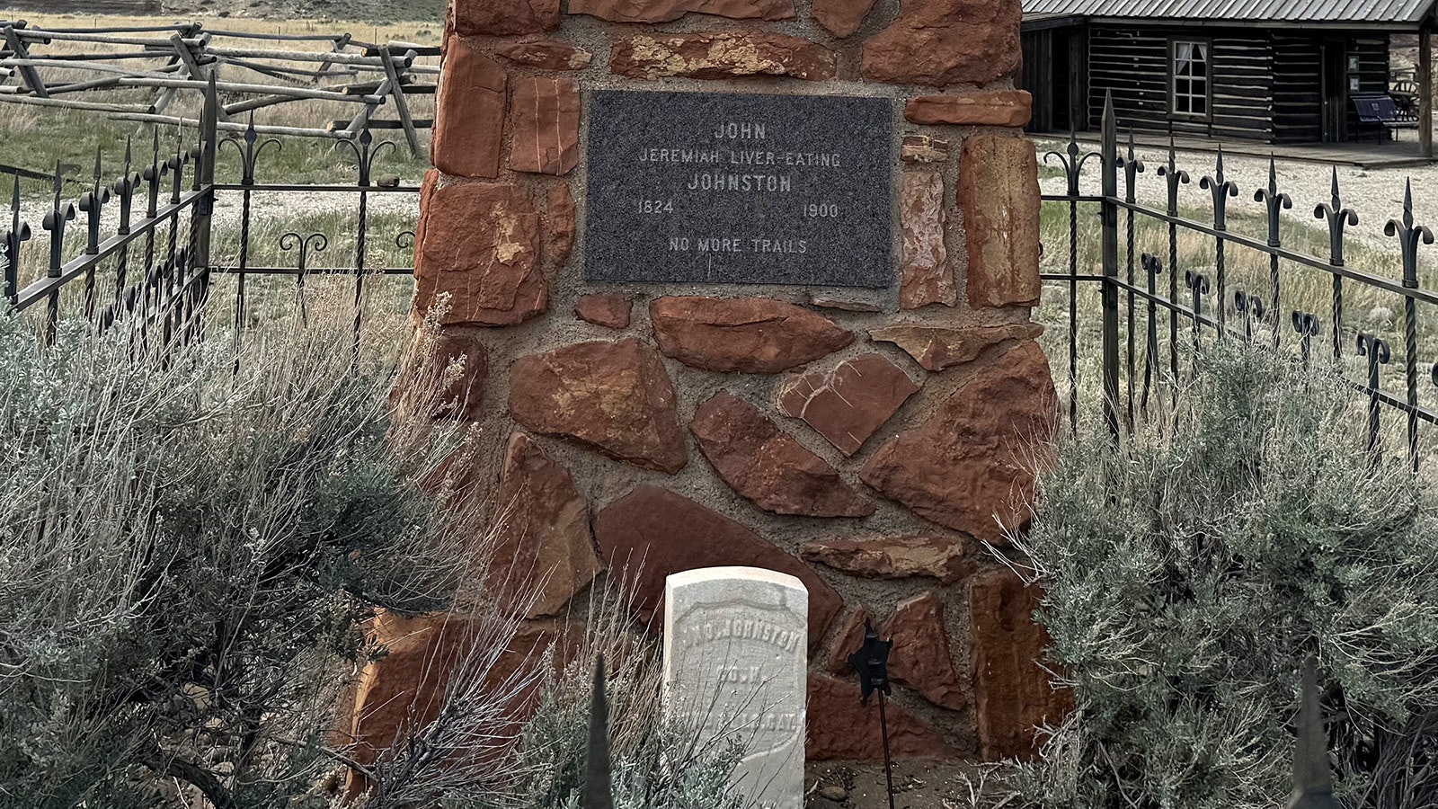 The remains of John "Liver-Eating" Johnson are marked in Old Trail town by a large marker and a sculpture of him. And he's not going anywhere. After his burial, two trucks worth of concrete filled in the gravesite. Note the monument names him as "Jeremiah" Johnson because of the movie, which wasn't his true name.