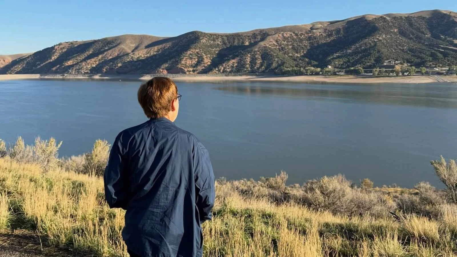 Many of those serving at F.E. Warren Air Force Base in Cheyenne have something in common with Lucy Rose — they know what it’s like to be lonely. Rose was at the base this week on her cross-country trip to fight loneliness. Here, she stops at a lake near Cheyenne.