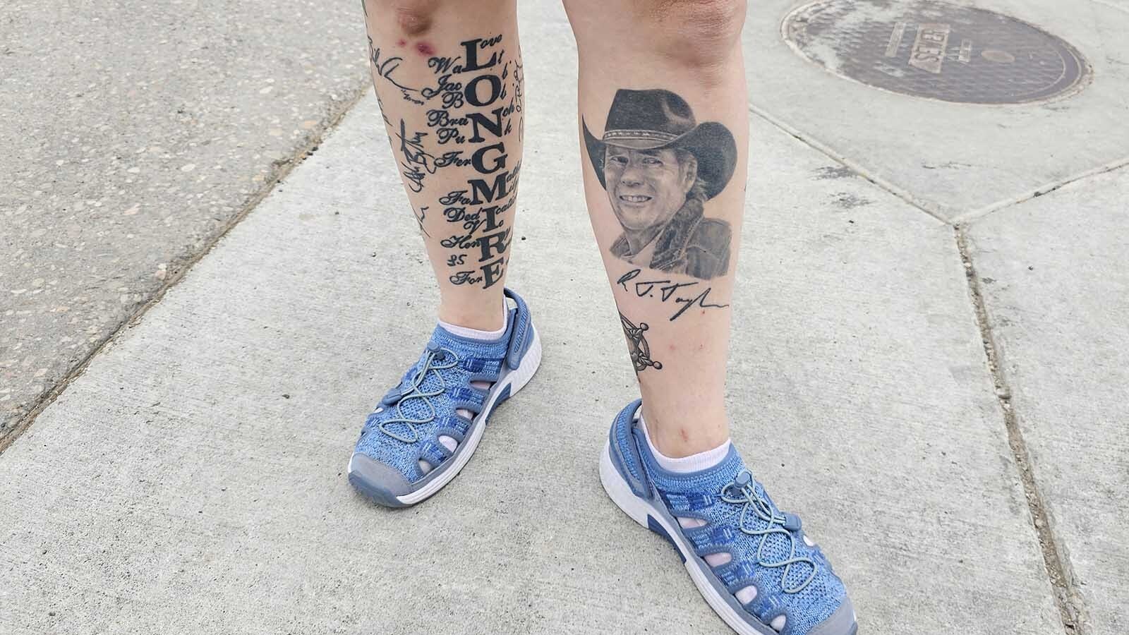Janet Hartung has Longmire tattoos on both legs, including her favorite actor Robert Taylor's signature.