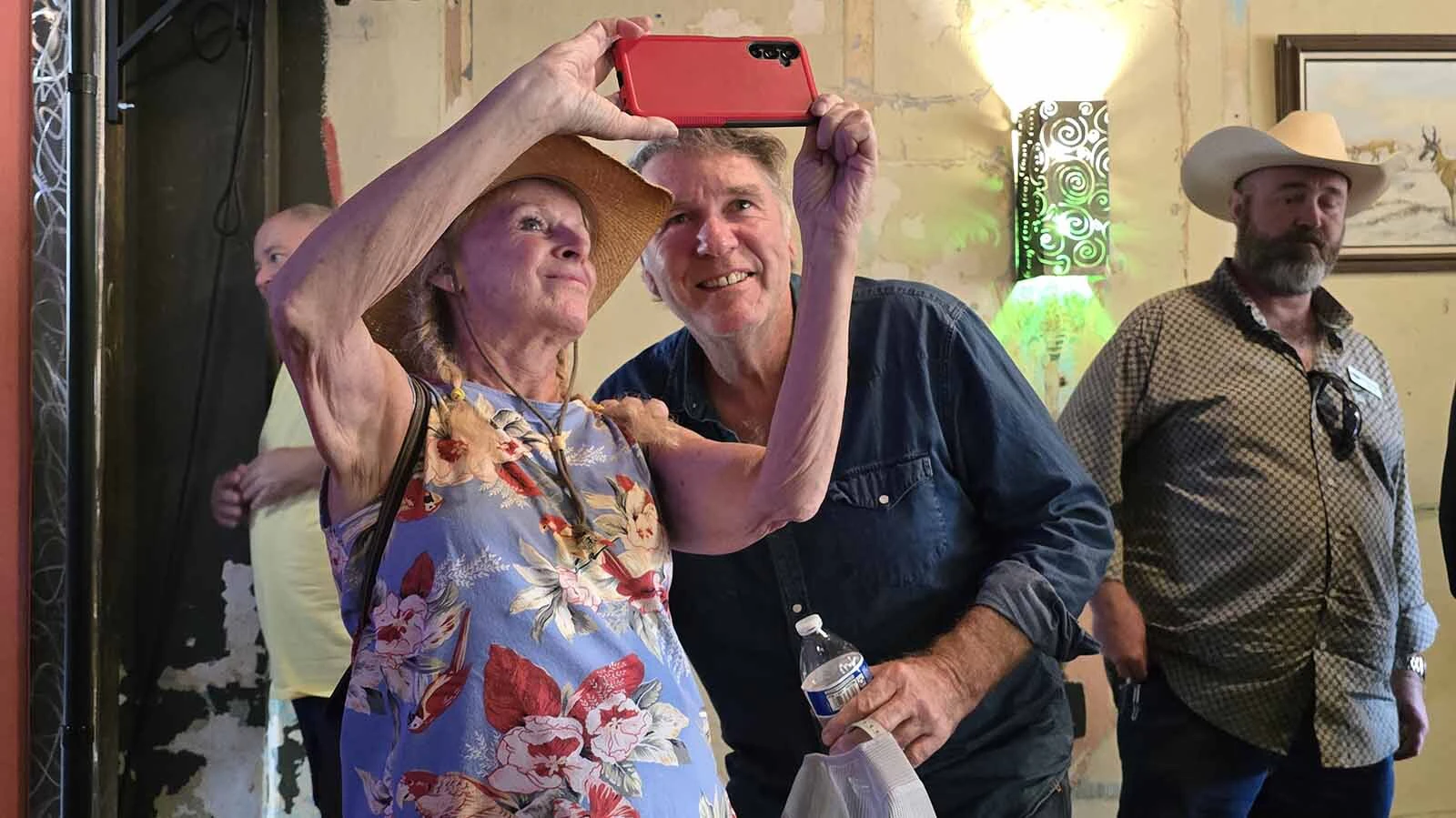Walt Longmire actor Robert Taylor stops to take a selfie with a "Longmire" fan during Longmire Days in Buffalo.