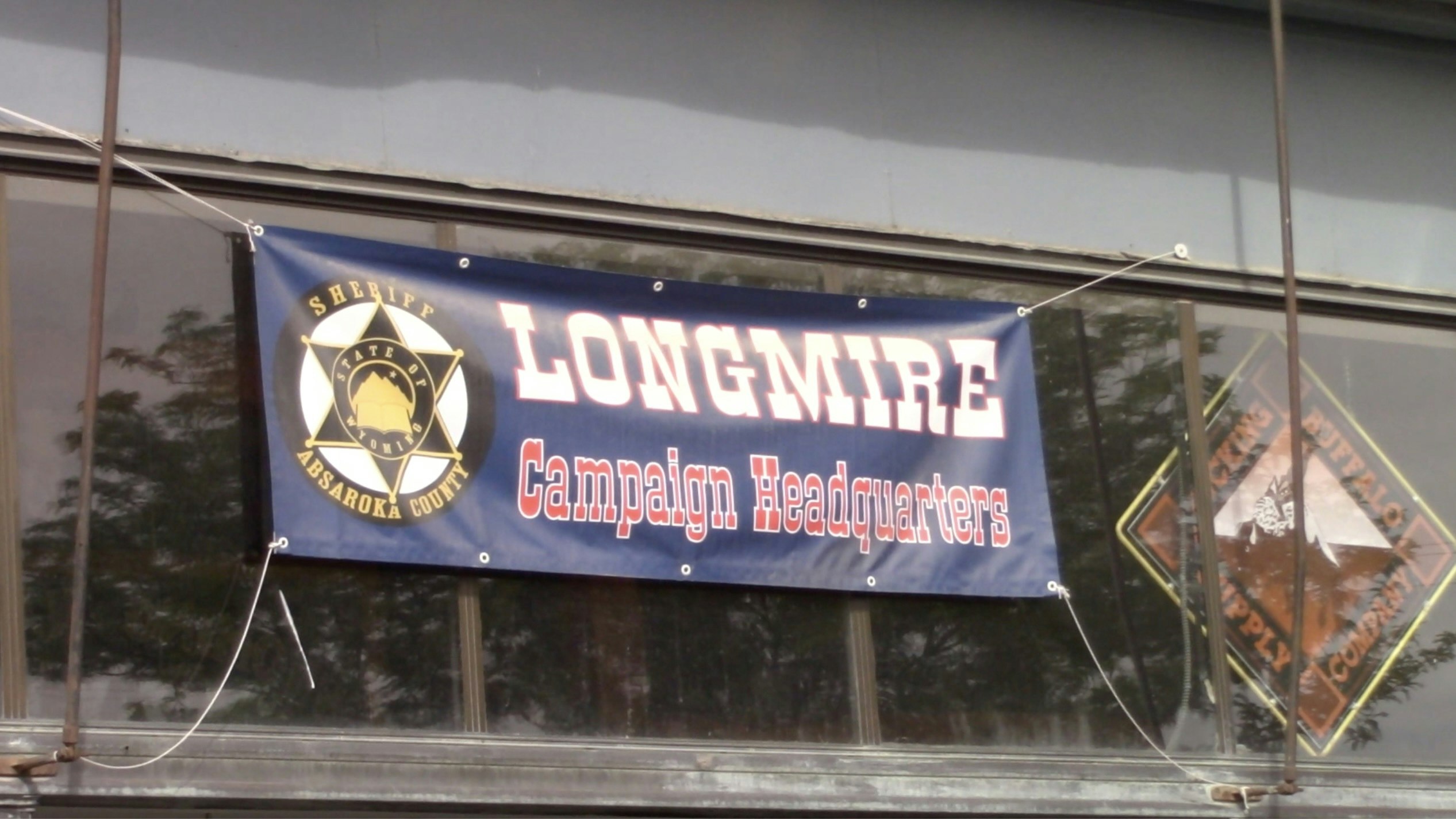 Banner promoting fictional character Walt Longmire for Sheriff in Buffalo.