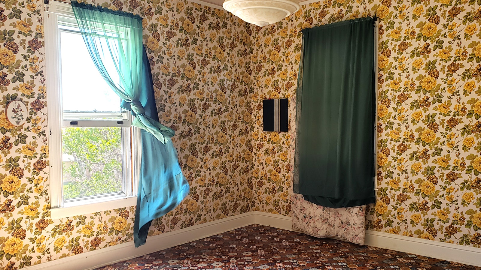 One of the five bedrooms at the J.B. Okie Mansion. All of the rooms are getting new carpet.