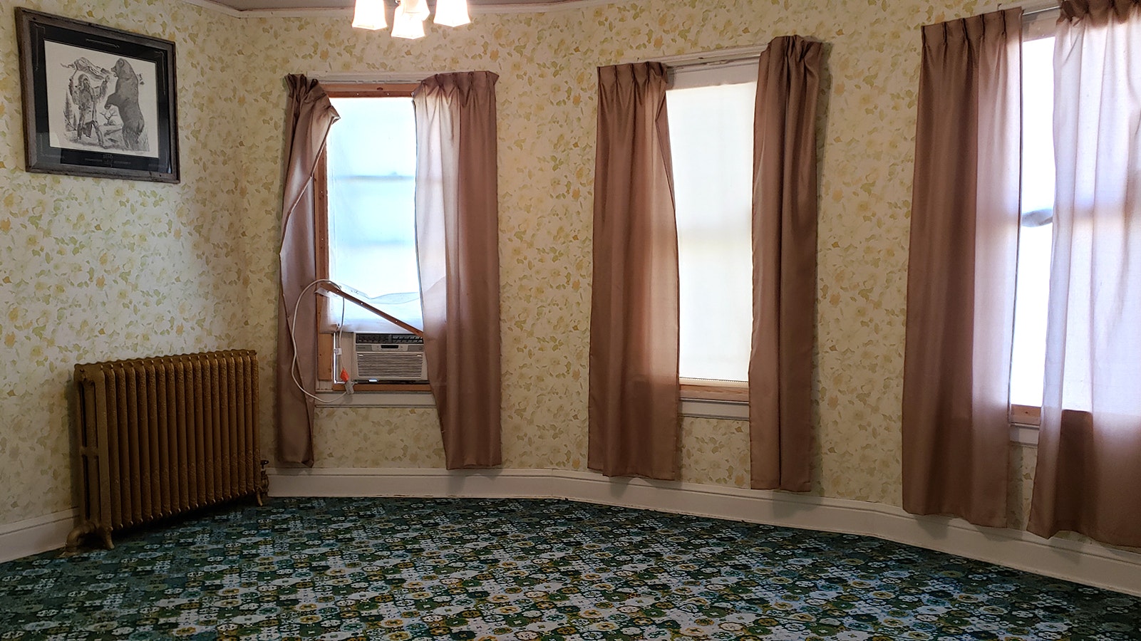 Another of the bedrooms with dated decor.