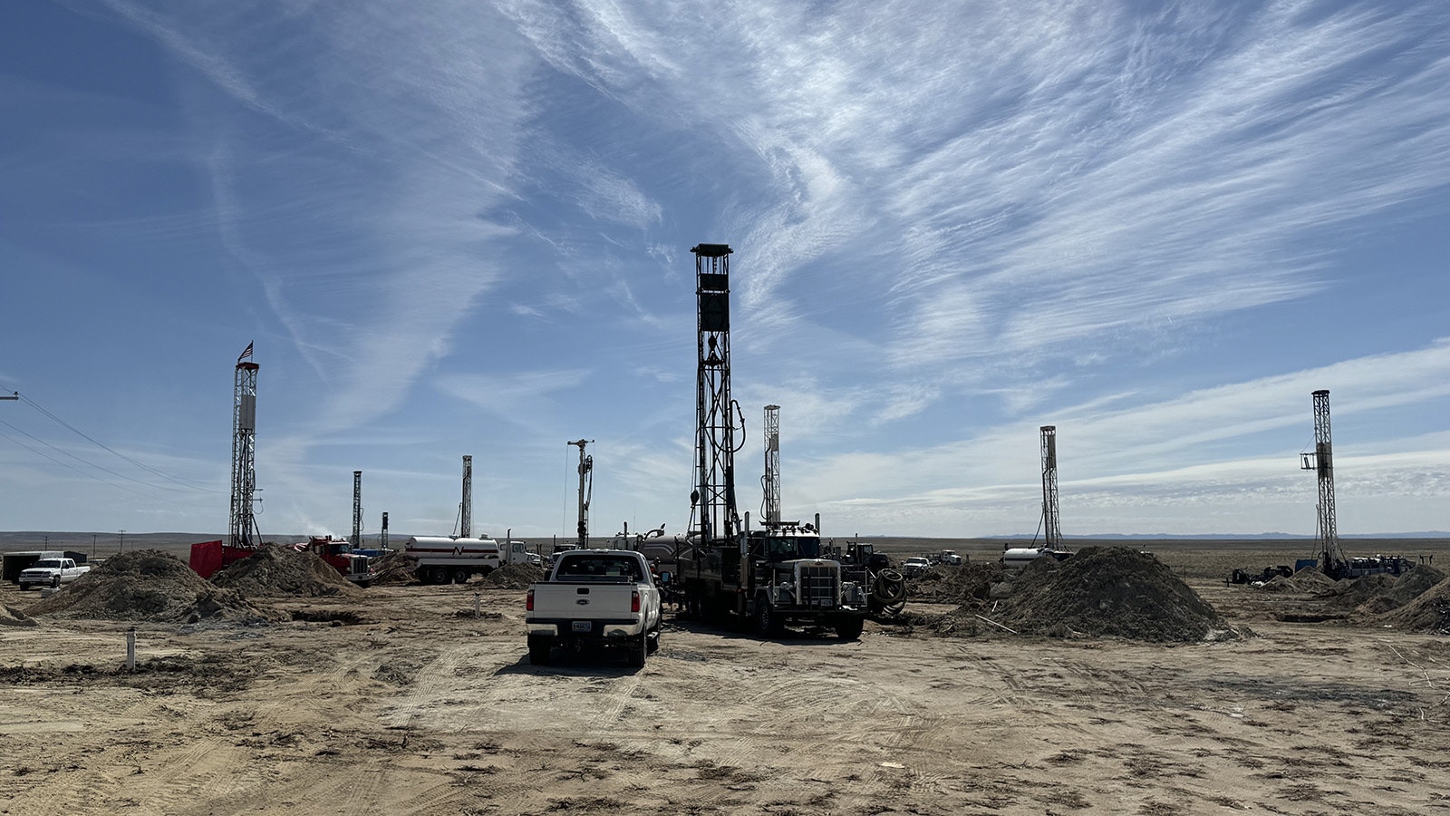 Ur-Energy’s in-situ mining field for uranium with water rigs set up in the background.
