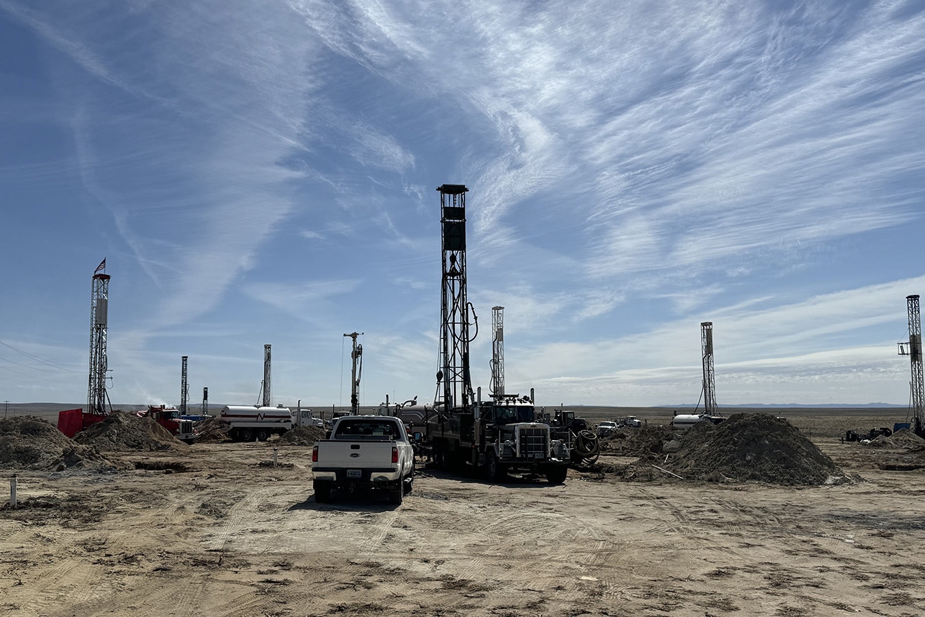 Ur-Energy’s in-situ mining field for uranium with water rigs set up in the background.