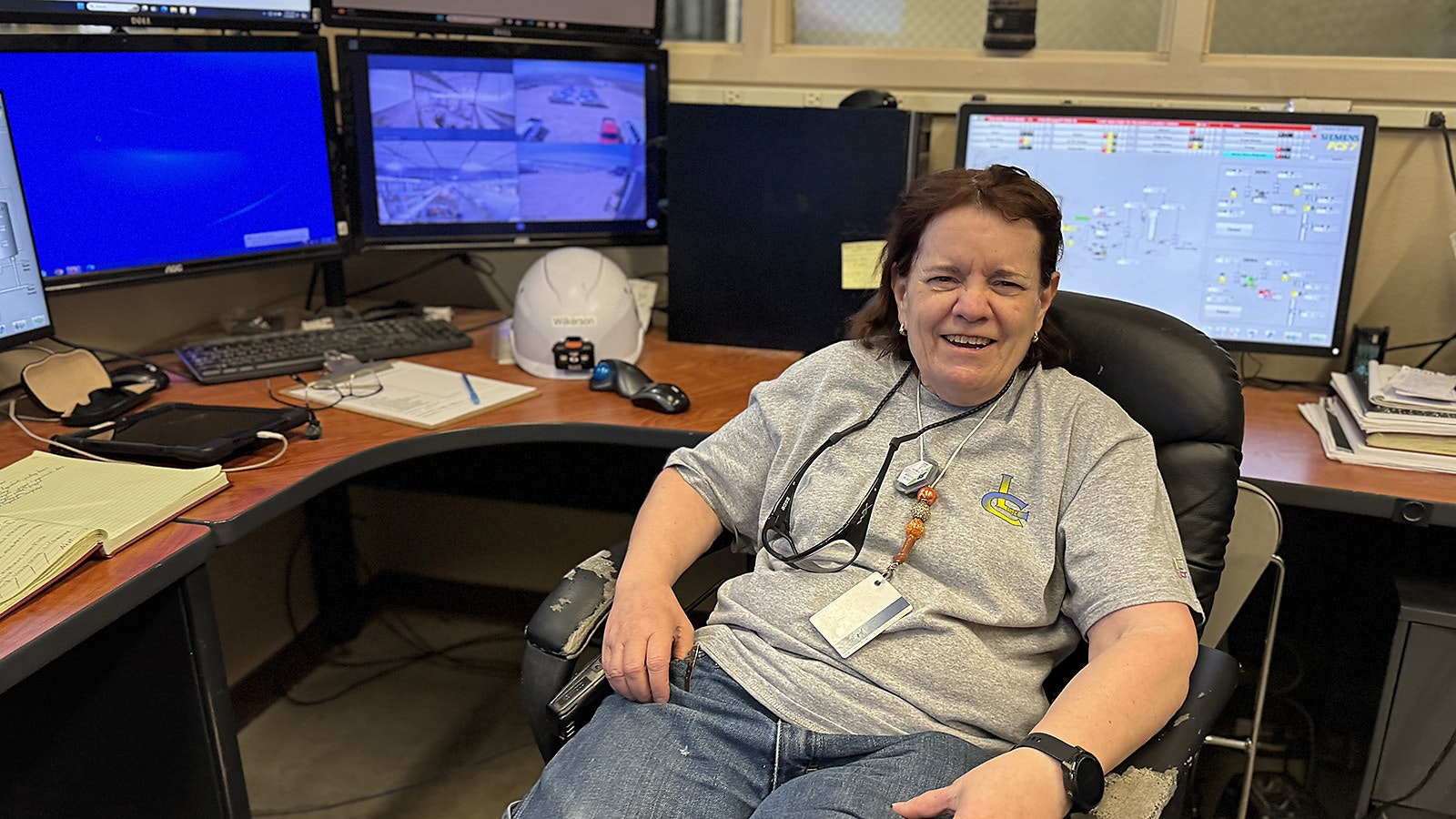 Dorothy Wilkerson, the plant operator, sits in a control room in Ur-Energy’s processing facility, surrounded by computer screens. She’s trying to catch a pipe break by monitoring all the fluid flows and pressures in the pipelines throughout the entire operation.