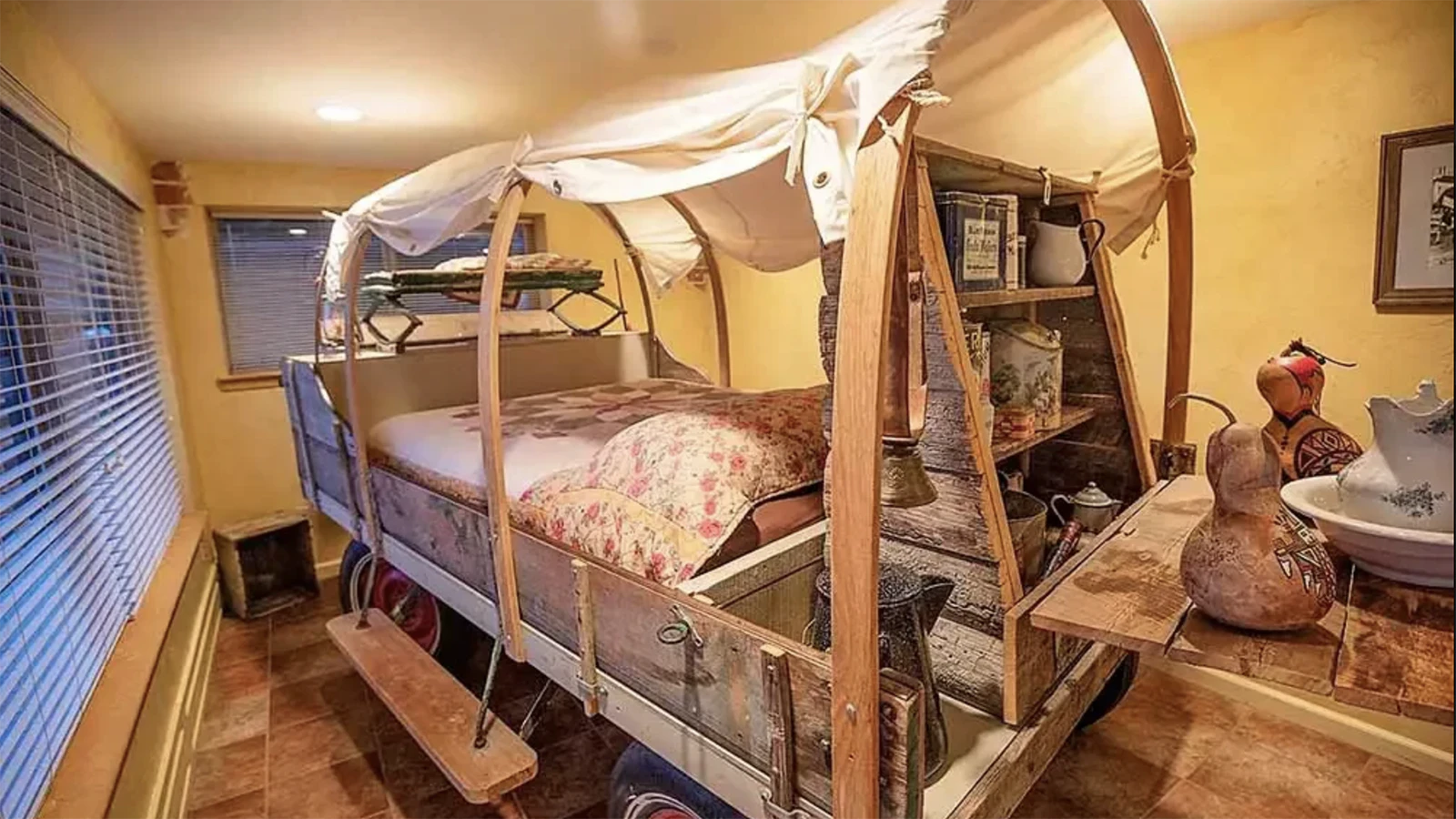 At the K3 Guest Ranch, Jerry Kinkaid built a room with a unique chuckwagon bed. This canvas covered wagon is a silent nod to his dad, Harley, who in the 1940s took a wagon full of rodeo queens on a fun trip from Cody, Wyoming to Crook City, Montana. Even though it was a fun time, it failed financially and only became a dream — that Kinkaid was able to resurrect in his own way with a guest ranch.