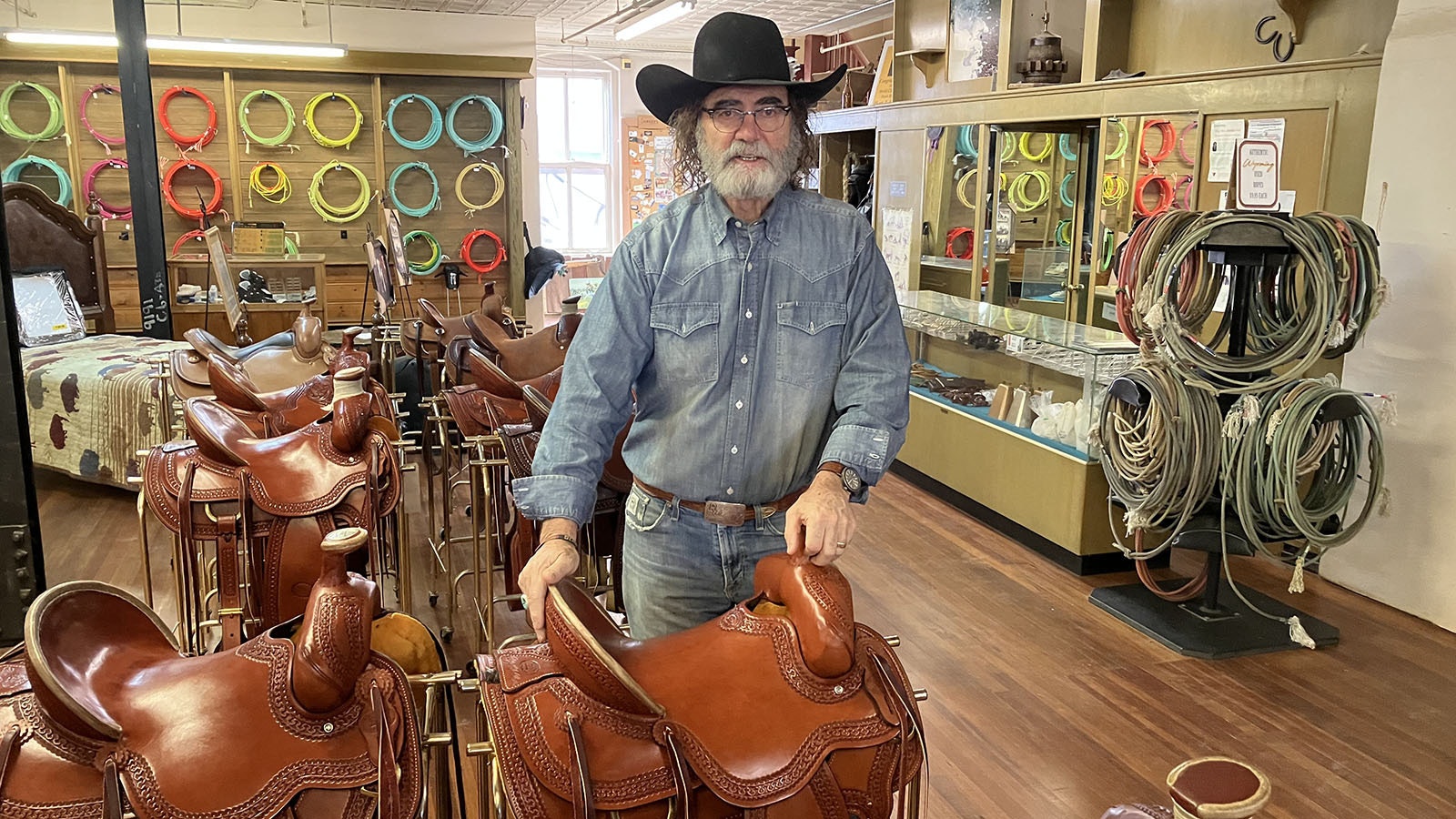 Louis Taubert Jr. poses on the saddle and tack floor at his family’s store in downtown Casper. He represents the third generation of the family business.