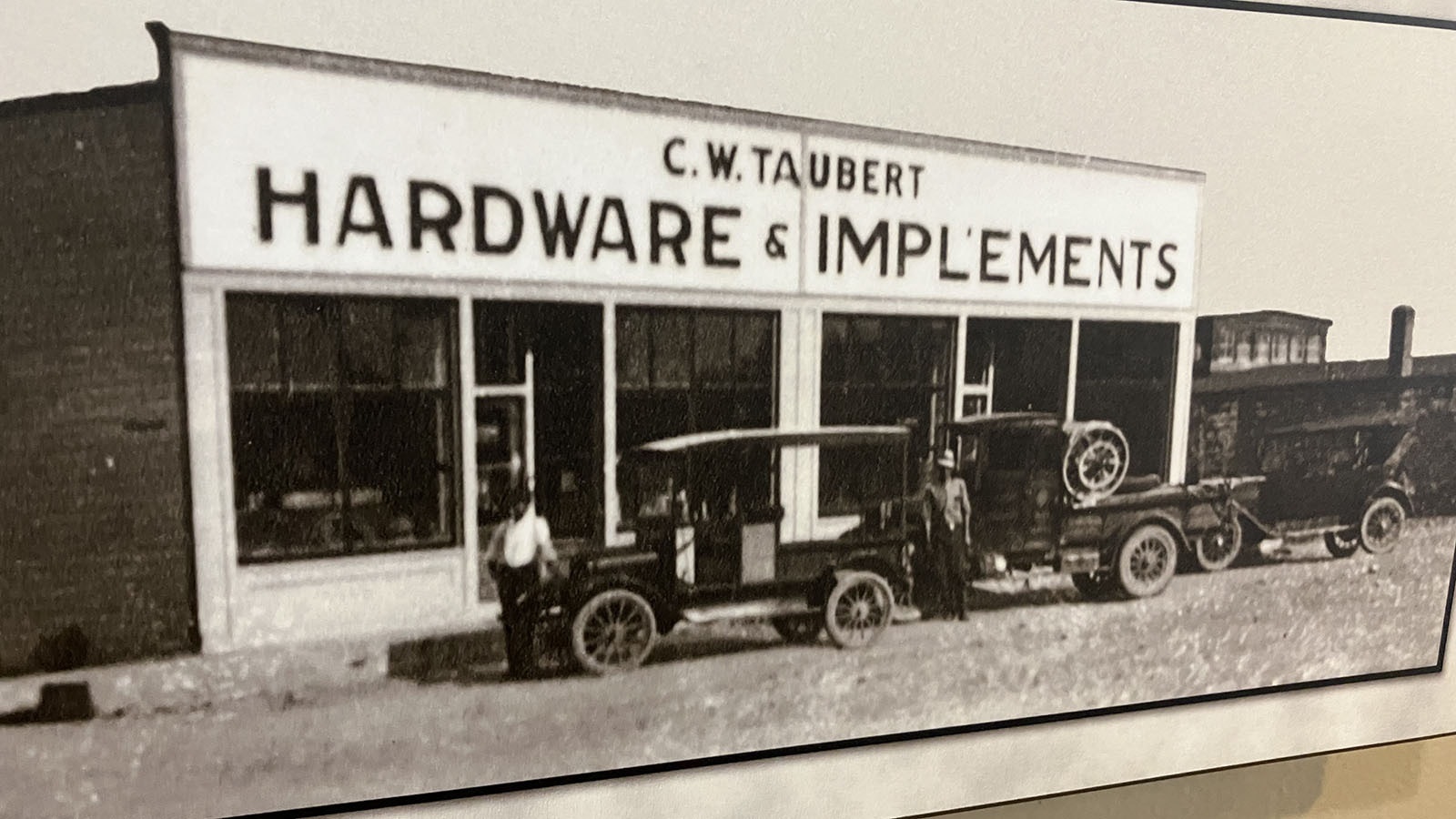 A photo on the wall at Lou Taubert Ranch Outfitters shows the Fort Laramie, Wyoming store where C.W. Taubert launched the retail business in 1919.