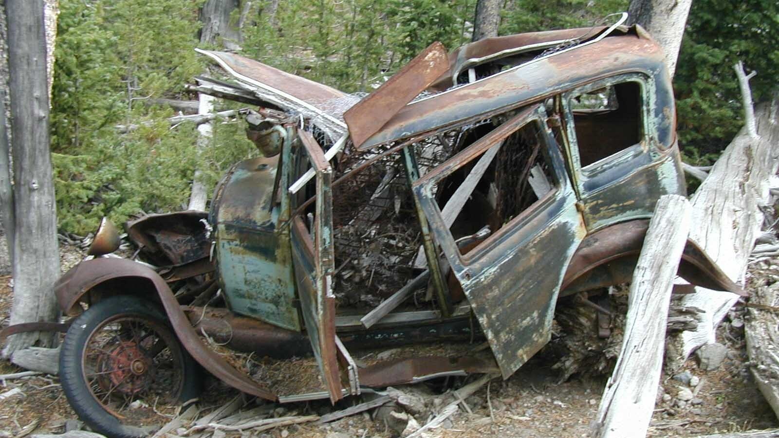 The wreckage of an old Model T that missed a turn on the Louis Lake Road near Lander sat alongside the road for decades, until somebody finally came and hauled it off.